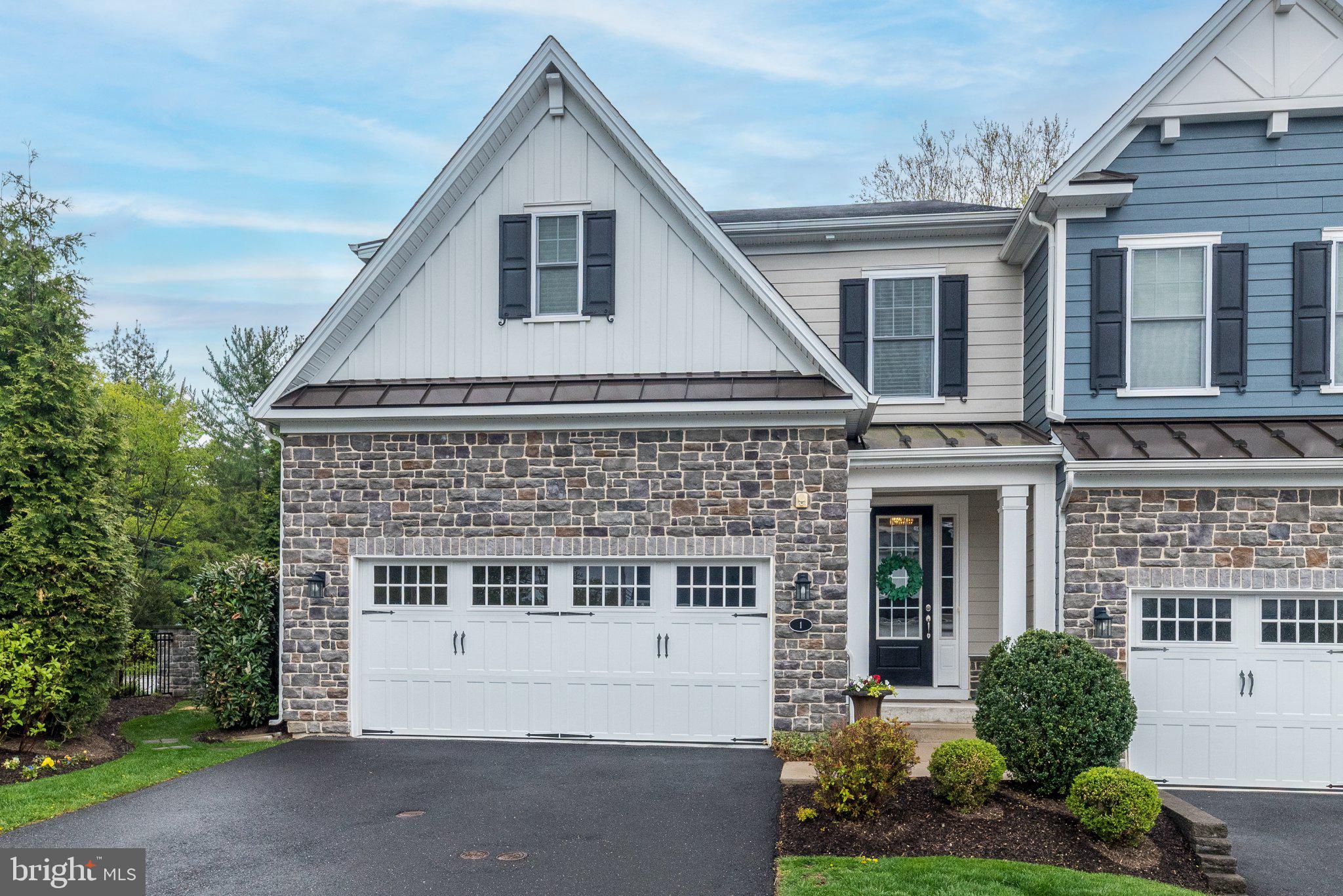 Discover an exceptional opportunity to own a beautifully appointed carriage home in the highly sought-after Fairland at Gwynedd community—where refined design, modern comfort, and effortless living come together. Fully loaded from top to bottom with countless upgrades, this designer showcase home embodies true luxury with everything you could want in a home and more. The Berkeley's open-concept layout provides the feel of a detached home and is ideal for those that love to entertain. Step inside this beautiful end-unit carriage home to find a warm and inviting atmosphere that immediately impresses with elevated luxury finishes and a carefully designed interior. Nine-foot ceilings, abundant natural light, and wide-plank wood flooring create a bright, open ambiance throughout the main living spaces. The spacious great room, highlighted by a sleek gas fireplace, seamlessly connects to a generous dining area—ideal for hosting gatherings both large and small. The gourmet kitchen serves as the centerpiece of the home, beautifully designed with high-end appliances, classic white cabinetry, Caesarstone Quartz countertops, and an oversized island perfect for entertaining. The expansive kitchen extends to a fabulous butler's pantry with a separate prep and serving area and a custom designed entertainer's closet and food pantry. Step outside to the most unique and fun "room" in the house, the outdoor living area. The covered Trex deck comes complete with custom automatic privacy screens that you can enjoy in any weather or season. Upstairs, the deluxe primary suite provides a quiet escape, enhanced by architectural detail and generous proportions. Dual walk-in closets offer abundant storage, while the ensuite bath delivers a spa-like feel with double sinks, an oversized glass-enclosed shower, and refined finishes throughout. Two additional bedrooms each include their own private bathrooms and ample walk-in closet space. A conveniently located laundry area completes this level. The finished lower level adds valuable bonus space with a dedicated home office and storage area, ready to adapt to your needs. Whether it’s a media lounge, fitness area, or playroom, the open layout with access to the outside allows for endless possibilities to personalize the space. Every element of this luxury carriage home has been carefully crafted to support a low-maintenance, high-comfort lifestyle. Located in one of Lower Gwynedd’s most desirable communities, this property offers a rare combination of modern design, everyday convenience, and a truly elevated living experience. Recognized for its thoughtful planning and vibrant atmosphere, this award-winning community offers a unique blend of elegance and convenience in desirable Lower Gwynedd Township, within the top-rated Wissahickon School District. Just minutes from fine dining, boutique shopping, and daily essentials, the location provides both accessibility and a peaceful residential setting. You'll love living here!