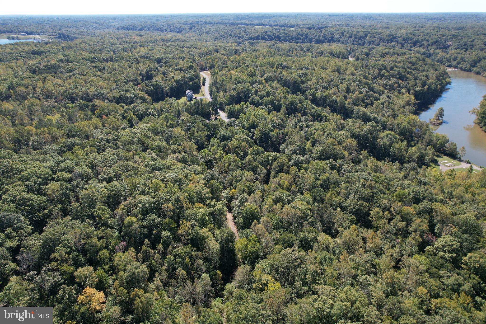 Amazing 10 acre wooded oasis in Stafford County! No HOA. The best of both worlds, a perfectly secluded lot just 10 minutes from shopping, restaurants and commuting options! Current owners have done all your homework for you. Survey and soil work have been completed and the future 4 bedroom perc septic system and well site have been flagged on the lot. Survey, topography map and other documentation are available upon ratification. This lot has NO protected wetlands and has an existing driveway along the 50 foot deeded easement. At the site you'll find a partially cleared potential homesite location, walking trails, and additional level areas for agricultural animals, sheds, gazebos, ect! There is also a potential for water views of the Rappahannock River in winter depending on tree clearing or type of home built. Pictures do not do this land justice. Please visit in person and watch the various video tours provided!