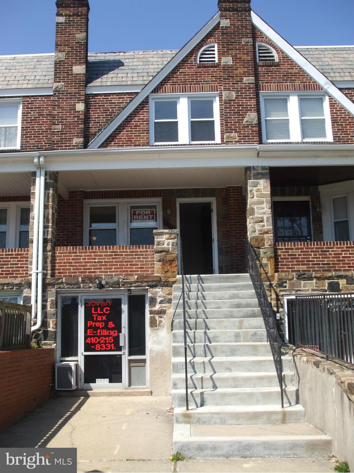 LOCATION! LOCATION!BUS LINE OUTSIDE THE FRONT DOOR.LOTS OF TLC USED TO UPGRADE THIS HOME!!SPACIOUS KITCHEN WITH NEW CABINETS,FLOORING AND COUNTERS SHINY HARDWOODS IN ALL ROOMS!  TILE FLOORS IN KITCHEN AND FULL BATH
