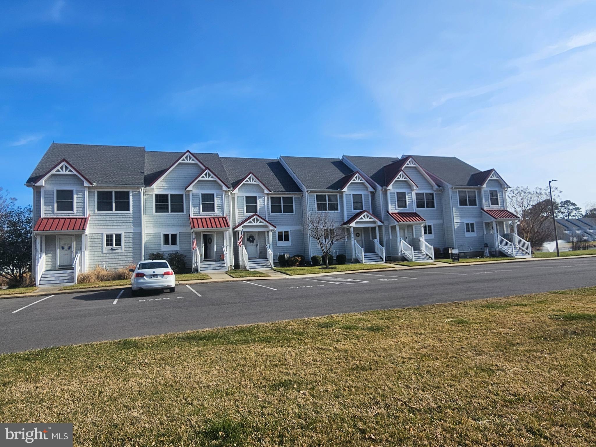 Welcome to Ocean Village at Old Bridge, a beautifully appointed condominium offering the perfect blend of coastal lifestyle and everyday convenience in the heart of West Ocean City. This spacious 3-bedroom, 2.5-bath residence spans approximately 1,768 square feet and delivers a thoughtfully designed layout ideal for both full-time living and effortless entertaining. Step inside to discover light-filled living spaces that flow seamlessly to an upper balcony and lower deck, where peaceful pond views create a calming backdrop for morning coffee or evening relaxation. The home’s generous proportions provide comfort and flexibility, while the private outdoor spaces invite you to embrace indoor-outdoor living year-round. Beyond your front door, Ocean Village offers resort-style amenities that elevate daily life, including indoor and outdoor swimming pools, tennis courts, a modern fitness center, and a playground for all ages. Located just minutes from premier shopping, dining, and coastal attractions, this community places everything you need within easy reach while preserving a tranquil, residential atmosphere. Whether you’re seeking a primary residence, second home, or investment opportunity, this exceptional condominium delivers lifestyle, location, and lasting value in one of West Ocean City’s most desirable communities.