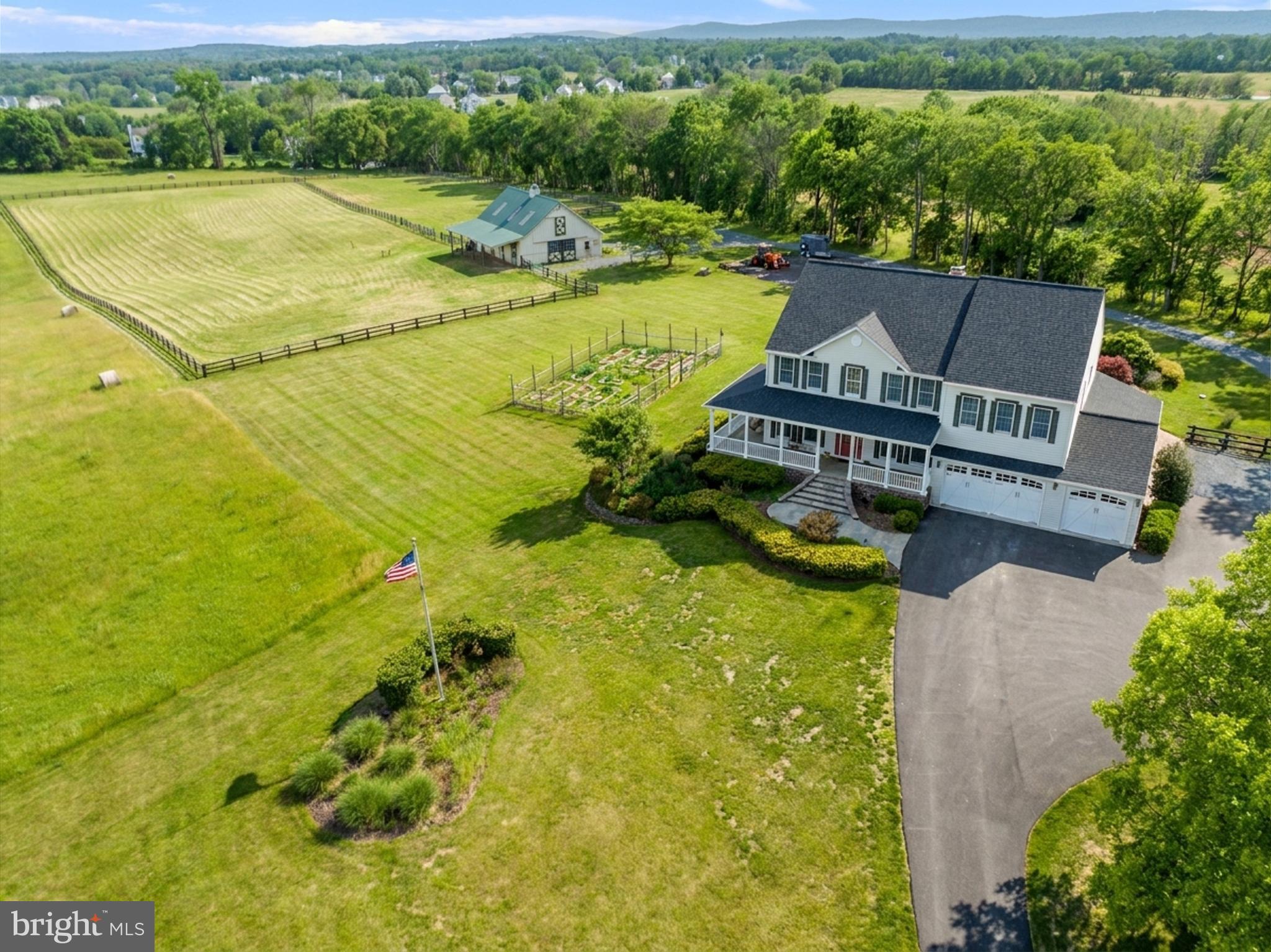 Welcome to Locust Hill Farm, a spectacular 11.44-acre equestrian estate framed by the breathtaking Catoctin Mountain Range and Furnace Mountain. 
For the Equestrian & Nature Lover!  Bring your horses, chickens, and goats! The property features a pristine 4-stall barn equipped with a hayloft, tack room, heating/AC, hot & cold water, and a powder room. Enjoy front and rear turnouts with classic board fencing and a run-in shed.
This custom-built, 5-bedroom, 4.5-bathroom home spans over 5,200 finished square feet of light-filled, open-concept living space. Walk up the flagstone path to the inviting wrap around porch perfect for watching the sunrise. Step inside to soaring cathedral ceilings, a formal living and dining room, a main-level library, and a spacious two-story family room anchored by a dramatic stone fireplace. The gourmet kitchen is a chef’s dream, featuring a grand center island, updated appliances, tons of cabinetry, and a bright breakfast area that flows seamlessly to a custom deck and patio ready for you to relax and view the sunset.
The upper level is a sanctuary, boasting a palatial primary suite with a sitting area, expansive walk-in closet, and a luxury spa bath, alongside spacious secondary bedrooms (including an en-suite). The fully finished walkout lower level is built for entertainment, complete with a custom TV area, fireplace, pool table room, bar, game room, and a 5th bedroom with a full bath and steam room.
With no HOA, stunning rolling meadow views, and exceptional sun exposure, this is your ultimate private paradise!