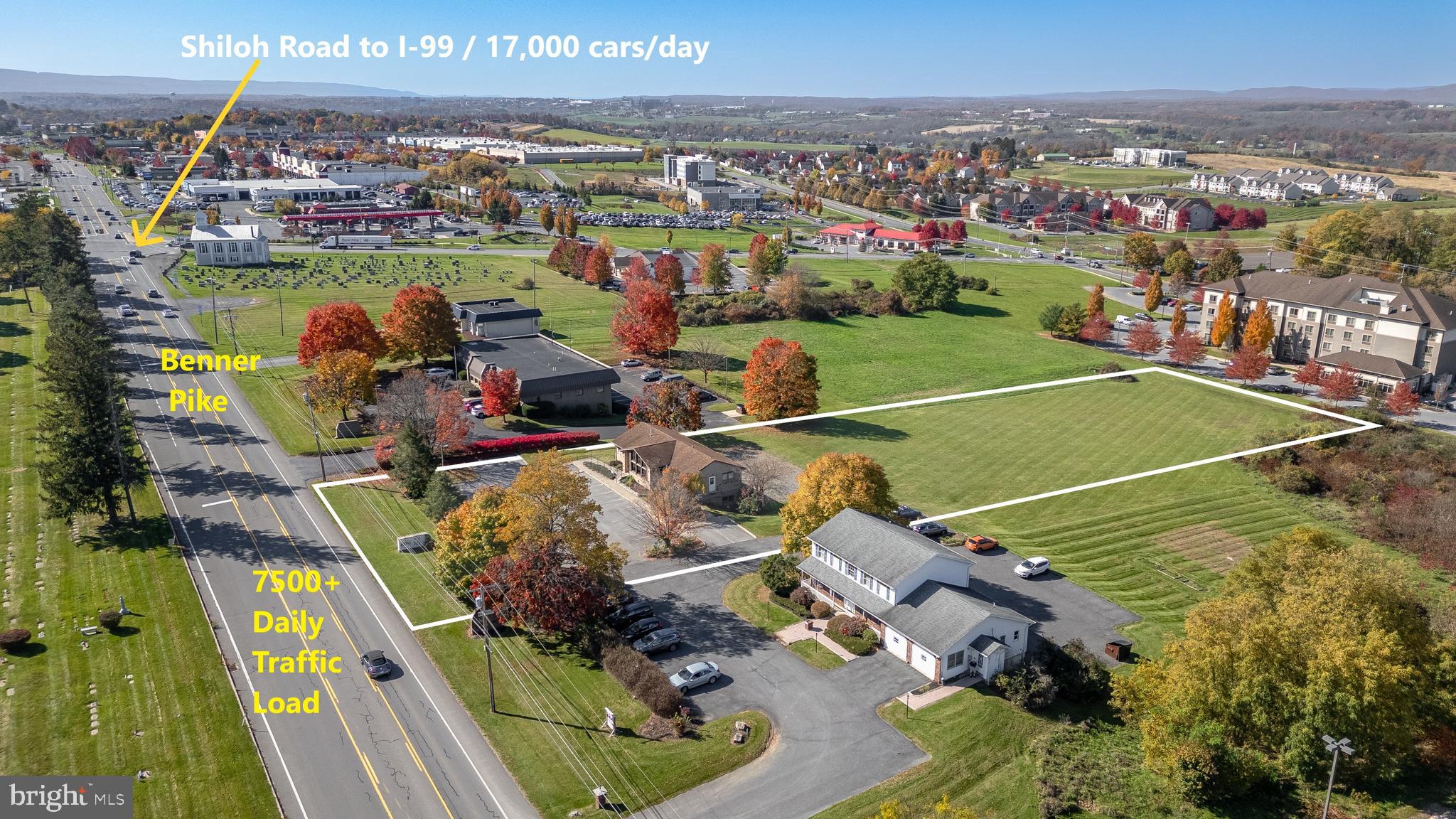 Exceptional commercial investment and development opportunity just 3 minutes from I-99 (Shiloh Road Exit 76). This highly visible 2-acre property is strategically positioned on Benner Pike between Sheetz and Tractor Supply, offering outstanding exposure, easy access, and strong daily traffic counts in one of the State College region's most active commercial corridors.

Zoned General Commercial, the property allows for a wide range of business uses, including automotive services, showrooms, financial institutions, medical offices, veterinary clinics and kennels, daycare facilities, hotels, health clubs, salons and spas, funeral homes, and many other commercial ventures.

The existing building, constructed in 1989, is well-maintained and suitable for continued use, renovation, or redevelopment. With a level lot measuring approximately 150' x 560', the site provides flexibility for owner-users, investors, and developers seeking a premier location for expansion.

Situated in the heart of the rapidly growing State College market and home of Penn State University, this property benefits from the area's continued residential, commercial, and institutional growth. The location is surrounded by established retail, hospitality, and entertainment destinations and backs directly to Best Western Plus University Park Inn & Suites and UEC State College 12.

Nearby destinations include:

0.5 miles (3 minutes) to Nittany Mall
0.8 miles (4 minutes) to Walmart Supercenter and Sam's Club
3.4 miles (7 minutes) to Penn State University
4.3 miles (8 minutes) to Mount Nittany Medical Center, Bryce Jordan Center, and Beaver Stadium
A tenant is currently in place, with flexibility regarding future occupancy. Whether you're seeking an income-producing asset, a redevelopment opportunity, or the ideal location for your next business venture, this premier commercial property offers exceptional potential in one of Pennsylvania's strongest university-centered markets.

Your vision is the only limit to what this strategic location can become.