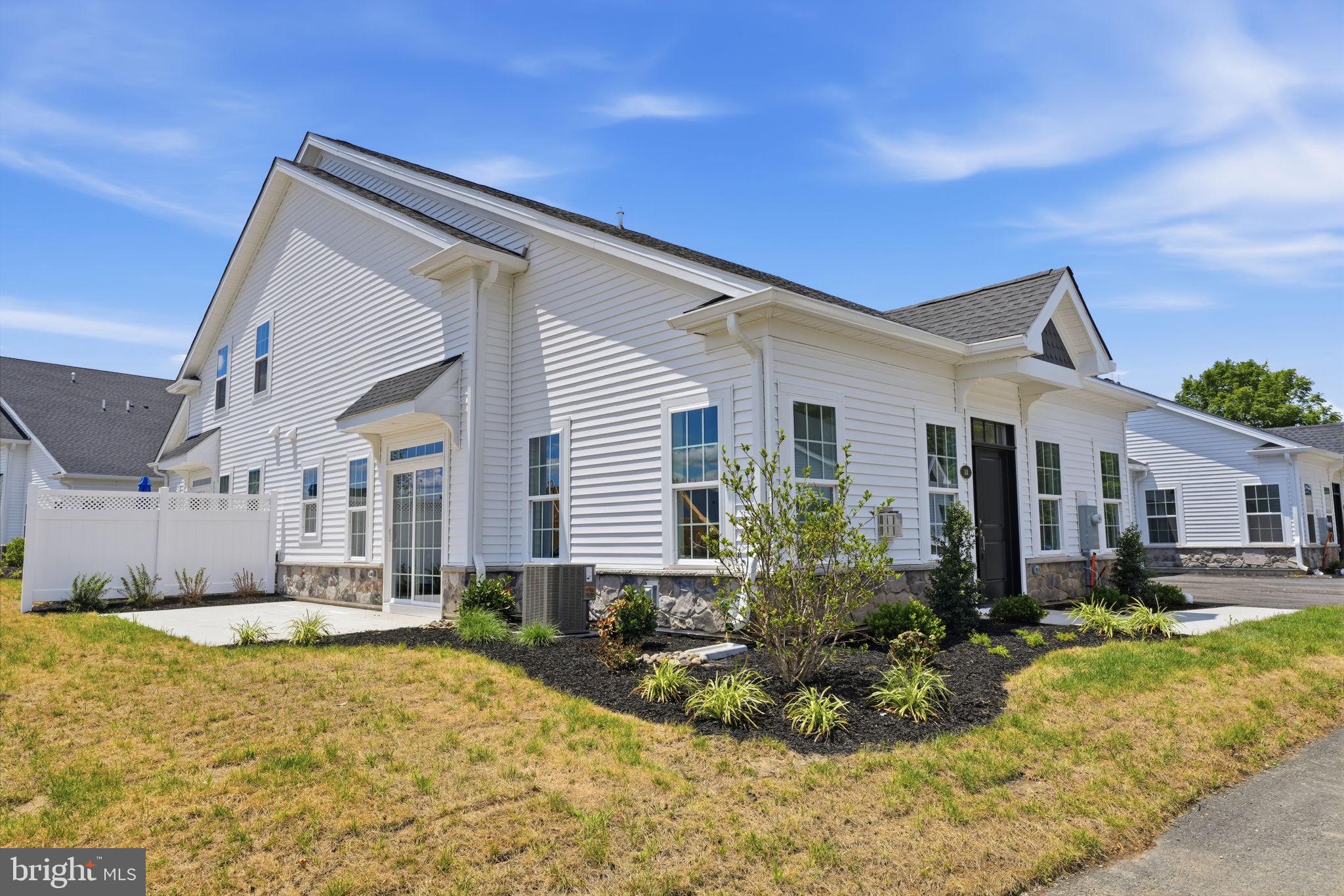 Welcome to 11 Cedar Circle, located in the sought-after Villas at Greenbrook—where luxury, convenience, and low-maintenance living come together beautifully. As only the second resale in this exciting new community, this exceptional home offers a rare opportunity to own a just three-month-old residence without the wait for new construction.

Step inside and you'll immediately appreciate the light-filled, open design, enhanced by soft, neutral décor and over $28,000 in thoughtful upgrades already completed for you. Featuring 2 spacious bedrooms and 2 full bathrooms, this home showcases a stunning kitchen complete with quartz countertops. Outside, the finished concrete patio creates the perfect space to enjoy your morning coffee or unwind at the end of the day.

Why wait months to build—and then spend thousands more on upgrades? Here, every finishing touch has already been carefully selected and completed, allowing you to move right in and start enjoying your new home from day one.

Even better, you'll be just minutes from the charm and energy of historic Bristol Borough, one of Pennsylvania's oldest river towns. Nestled along the Delaware River, Bristol has become one of Bucks County's most beloved destinations, offering a vibrant downtown filled with award-winning restaurants, boutique shopping, local festivals, waterfront parks, scenic walking trails, and the renowned Bristol Riverside Theatre. Whether you're enjoying an evening concert along the river, dining al fresco, or strolling the historic streets lined with beautifully preserved architecture, Bristol offers a lifestyle that's as rich in character as it is in community spirit. 

If you've been dreaming of new construction without the delays, the extra expense, or the unfinished details, 11 Cedar Circle is the opportunity you've been waiting for. Simply unpack, relax, and start enjoying everything this beautiful home—and the incredible Bristol lifestyle—has to offer.