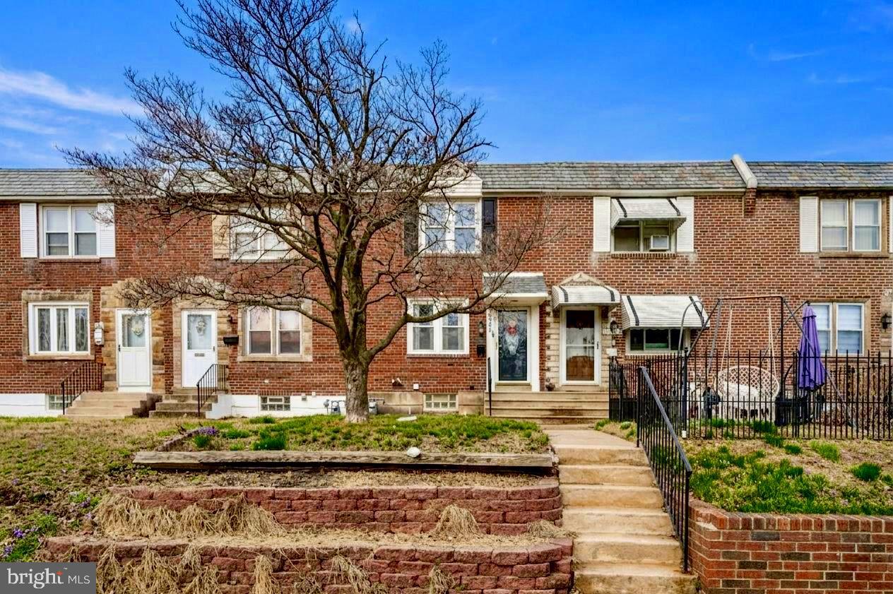 Nestled in the desirable Drexel Park Garden neighborhood, this charming 3-bedroom interior row townhouse blends timeless 1949 character with everyday comfort. Step inside to a bright, flowing layout featuring a spacious living area filled with natural light and classic brick-and-concrete construction that reflects lasting quality. The home offers an inviting eat-in kitchen area with generous space for dining and everyday convenience. A large deck extends the dining space outdoors, perfect for relaxing or entertaining.
Upstairs, three well-sized bedrooms provide peaceful retreats, complemented by a full hall bathroom with classic finishes. The partially finished basement features versatile space, ideal for a home gym, playroom, or den, with plenty of potential to customize to your needs. Outside, enjoy a low-maintenance lot with an attached garage and driveway for convenient parking. Located in Drexel Park Garden, you’ll enjoy quiet suburban living just minutes from parks, shopping, dining, and city access. A perfect opportunity to make this well-kept home your own.