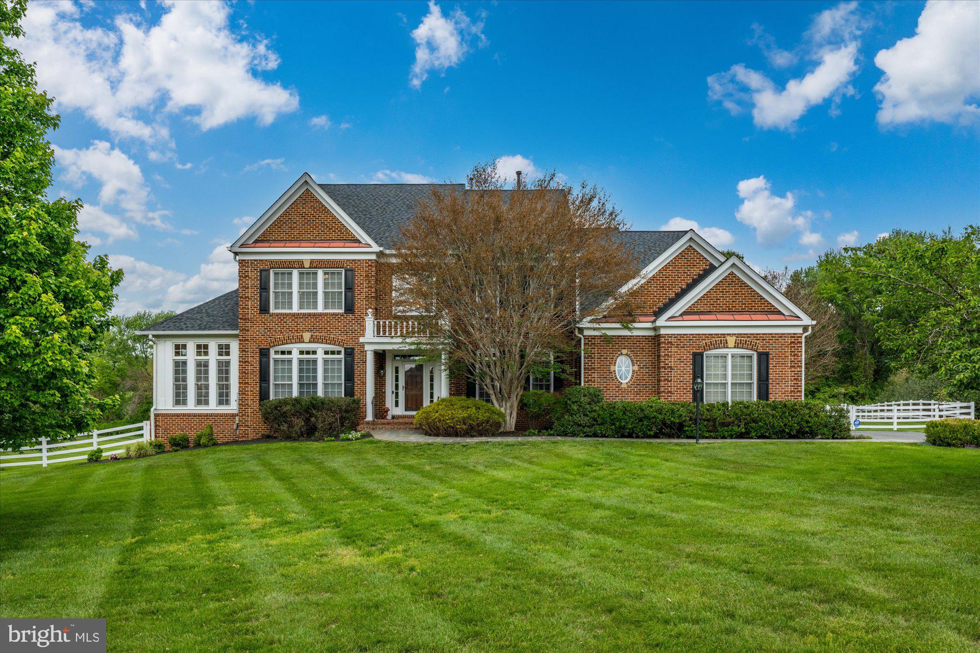 This one checks all the boxes! 12610 Hill Creek Court is a rare offering in the heart of Potomac — a beautiful, one-owner residence that has been lovingly maintained and kept in meticulous condition throughout. Perfectly sited on a quiet cul-de-sac with a level backyard, western exposure, and breathtaking sunset views, this exceptional property offers the ideal blend of elegance, comfort, and everyday livability — with ample room for a future pool.   A welcoming two-story foyer with a dramatic curved staircase sets the tone for the sophisticated interiors beyond. Designed for both grand entertaining and comfortable living, the home features an elegant music room, an impressive living room framed by three walls of windows, and a private study with a full wall of custom built-ins.  At the heart of the home is the stunning family room, highlighted by a striking stone fireplace and coffered ceiling, seamlessly opening to the chef’s kitchen complete with a breakfast bar, abundant workspace, and sunny table space eating area. The adjoining sunroom/playroom is filled with natural light and opens directly to the expansive deck and beautiful backyard, creating effortless indoor-outdoor living.  The sumptuous primary suite is a true private retreat, generously proportioned and thoughtfully designed for comfort and relaxation. A double-sided gas fireplace warms both the bedroom and adjoining sitting room, while the private covered balcony offers a peaceful sanctuary to unwind and escape the stresses of everyday life. The spa-inspired primary bath features a Jacuzzi tub, oversized stall shower, double vanities, and enormous walk-in closets.  The walk-out lower level delivers incredible entertaining space with a sprawling recreation room, full wet bar, billiards area, separate game room, and a private in-law/au pair suite — ideal for guests, extended family, or multigenerational living.  This opens to a flagstone terrace and huge backyard.  Start planning your summer parties!  This house will be the perfect spot to entertain friends and family!!  Ideally located within one of Montgomery County’s most coveted school districts and just minutes to the I-270 bio-med corridor, premier shopping, dining, parks, and commuter routes, this timeless Potomac residence offers an extraordinary lifestyle opportunity in an unbeatable location.  Make it yours today!