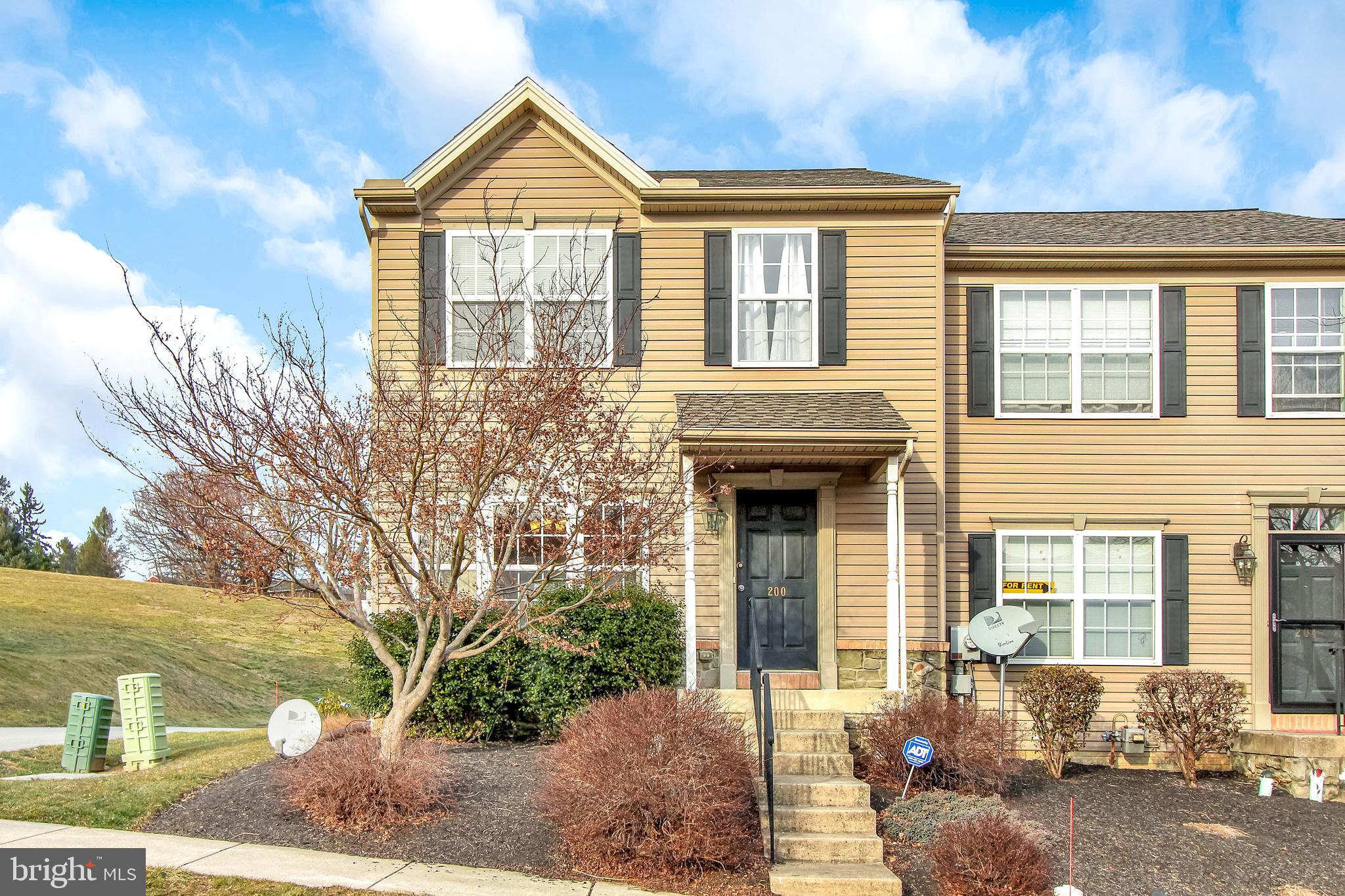 You will love this light and bright end-unit townhome available in  Manor Oaks.  Master bedroom with bath and walk-in closet. Open layout with spacious living room and door to deck. Fresh paint and newer roof. View of open space in the rear makes spending time on the deck and patio a pleasure. Additional living space in the finished basement. Convenient rear parking spaces for two cars. Carefree living with snow removal and lawn care included.