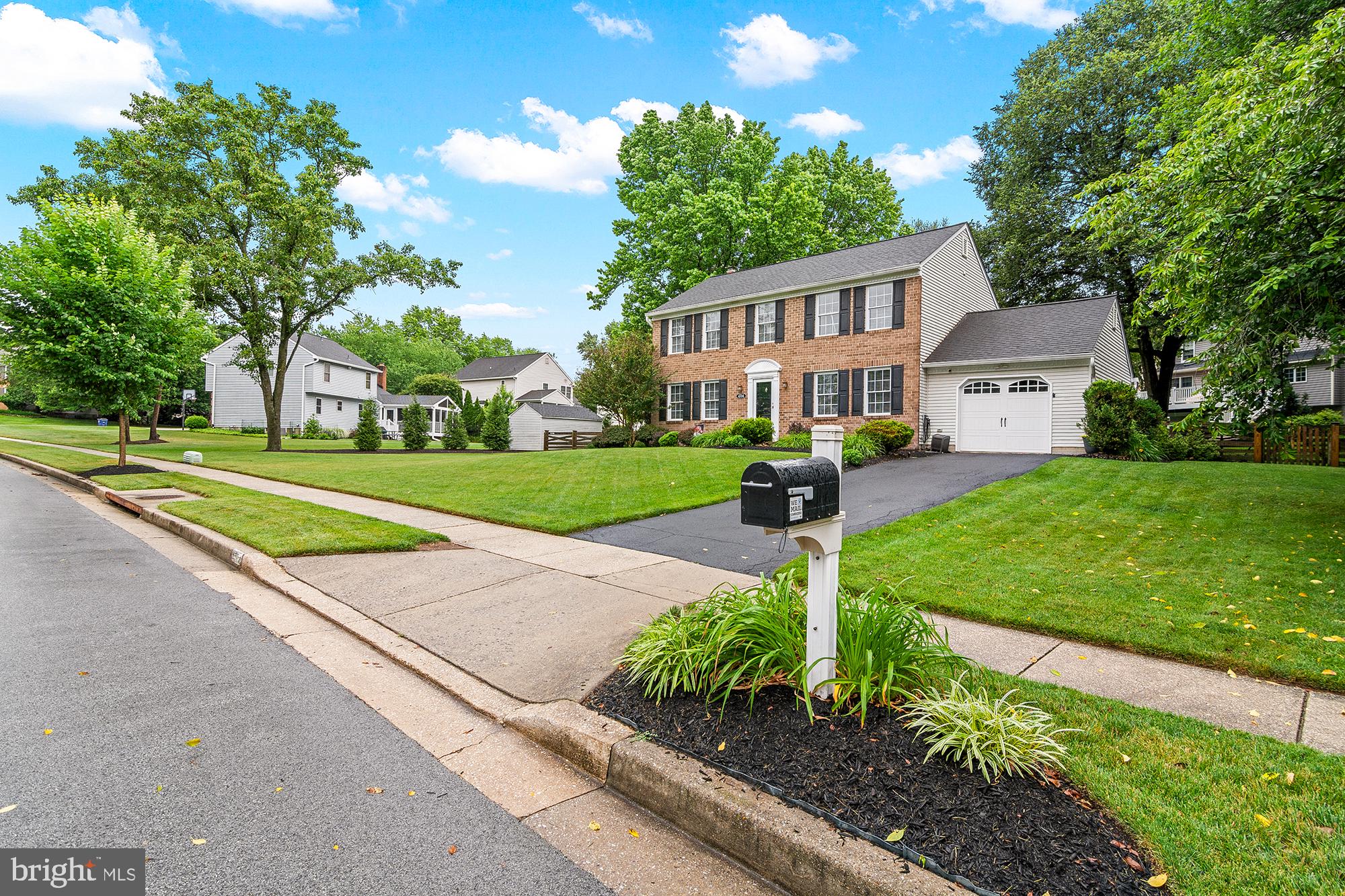 Nestled in the prestigious Brampton Hills, this exquisite Colonial-style residence exudes timeless elegance and modern comfort. This meticulously maintained home features four bedrooms and two and a half bathrooms, perfect for both relaxation and entertaining. Step inside to discover a warm and inviting atmosphere, highlighted by gleaming hardwood floors and an abundance of natural light. The heart of the home is the beautiful kitchen, equipped with stainless steel appliances, upgraded countertops, and an eat-in area that seamlessly flows into the family room, creating an ideal space for gatherings. A formal dining room adds a touch of sophistication for special occasions. The cozy family room, complete with a wood-burning fireplace adorned with glass doors, invites you to unwind after a long day. The primary suite offers a private retreat with an en-suite bath, ensuring comfort and privacy. The partially finished basement provides additional living space with both interior and outside access, perfect for a home gym or entertainment area. Outside, the beautifully landscaped front and rear yards offer serene outdoor spaces for relaxation or play. The lovely hardscape patio is ready for summer entertaining or a fire on a chilly fall evening. With an attached garage and ample driveway parking, convenience is at your fingertips. This home is not just a residence; it's a lifestyle, offering a perfect blend of luxury, comfort, and community. Experience the charm of Brampton Hills and make this stunning property your own.