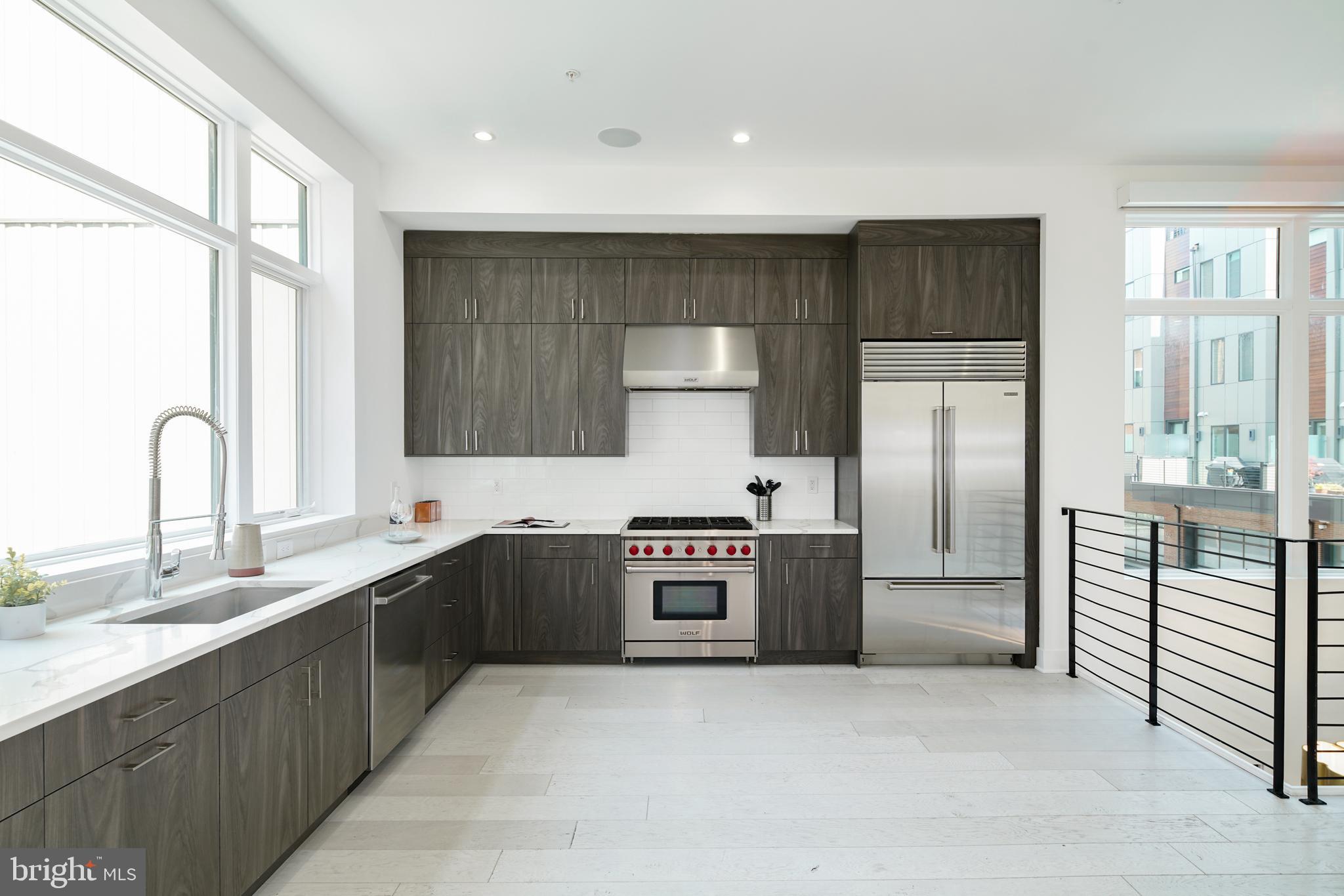 Discover this exceptional corner townhome offering a ton of living space including expansive decks with an attached 2-car garage and a 6-stop residential elevator providing direct access to the roof deck. Perfectly situated in the heart of Center City’s Old City/Society Hill neighborhood, this stunning residence combines luxurious design with urban convenience. Inside, you’ll find 4 spacious bedrooms, a dedicated home office, theater room, versatile flex space, 3 full bathrooms, and 2 half baths. Oversized windows flood the home with natural light, and the fully finished basement is ideal for a media room or personal gym. Just steps from Philadelphia’s vibrant waterfront, you’ll enjoy front-row access to the multi-million dollar Penn’s Landing Park expansion—set to redefine city living with green space, recreation, and community connection. Walk to theaters, fine dining, and cultural landmarks, all while enjoying immediate access to I-95 for easy travel. Live in the center of it all—luxury, space, and location, all in one of Philadelphia’s most desirable neighborhoods. Taxes and square footage to be verified by the buyer. There is a separate water fee of $87.72/month.