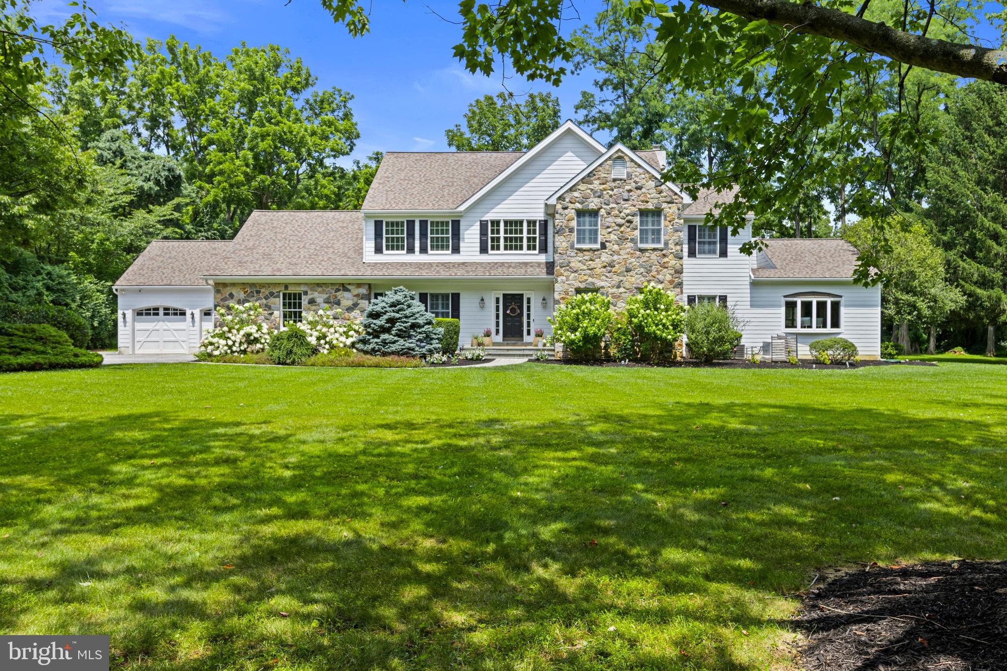 Welcome to 995 Baneswood Dr, a stunning single-family home in Kennett Square, PA, offering 4,606 square feet of thoughtfully designed living space set on an absolutely gorgeous tree lined street. This elegant property boasts 4 spacious bedrooms and 3.5 bathrooms, providing plenty of room for relaxation and entertaining.  The main level offers a grand foyer, a formal dining room with wainscoting, formal living room,  with an open-concept design that flows effortlessly into the eat-in kitchen. There is  a fabulous laundry/mudroom adjacent to kitchen with garage access providing functionality and convenience.  The kitchen is perfect for both casual dining and entertaining, and is equipped with a large island, builtin cabinetry with additional counter space, large pantry and an eating area that opens to a beautiful sitting room and family room anchored by a charming fireplace,  ideal for gathering.   In addition there is a huge versatile space that is currently being used as an in-home office, game room and additional family room with a wet bar, and fireplace. This space could work for an in-law suite if needed, first floor bedroom, au-pair suite and so much more, the possibilities are endless. The primary suite features two walk-in closets, a dressing area, and a luxurious en suite bathroom with double sinks and a soaking tub. Three additional bedrooms one with an en suite bathroom and hall bath complete the second floor.  From the kitchen or mudroom step outside to the barbecue area, flat back yard or relax on the screened in porch while enjoying outdoor living. For added convenience, this home includes a spacious three car garage with plenty of storage options and full basement offering exceptional flexibility. This home perfectly blends style, comfort, and functionality, 995 Baneswood Drive is ready to impress. Don't miss the opportunity to make this exceptional property your home—schedule your private tour today!