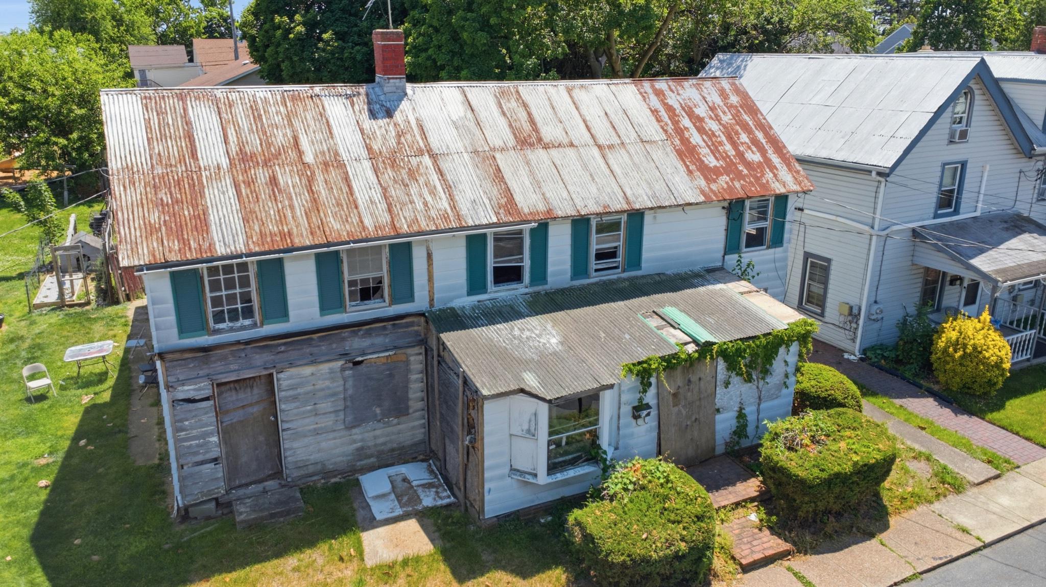 Investor or Real Estate Developer alert! Here's your opportunity to build a residential project in downtown Middletown, DE between N Broad Street and N Cass Street. The seller is offering two neighboring lots as a package deal (20 W Lockwood and 18 W Lockwood). The seller is providing a plan set to build a new set of twin homes on the lots. The plan is available in the disclosure section of Bright or by request.

These lots currently contain twin homes that are in a state of disrepair. Buyer will likely need to demolish and remove the current structure. Do not attempt to enter these buildings under any circumstances. The existing structure will likely need to be torn down and all debris removed from the property. Seller will accept cash or construction financing only.

Buyer is responsible for verification of school, town and property taxes. Buyer will also be responsible for obtaining any/all required permits and verifying the validity of the current plan if they choose to use it.