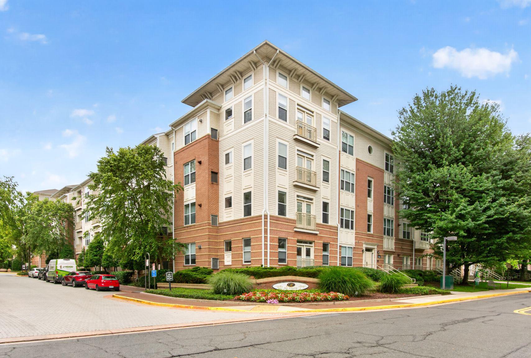 AMAZING VALUE on this clean, modern 1 bedroom condo in a sought-after building ACROSS FROM THE VIENNA METRO.  Light and bright with upgraded flooring (2022).  Juliet balcony.  Newer HVAC (2022).  Hydronic Water Heating System (2023).  Washer / Dryer IN UNIT.  Amazing amenities including outdoor pool, INDOOR BASKETBALL COURT, fitness center, lounge, and business center.  Close to the wonderful town of Vienna, with community amenities, shopping and restaurants.  Easy access to I-66 and I-495.  Parking space G-302.