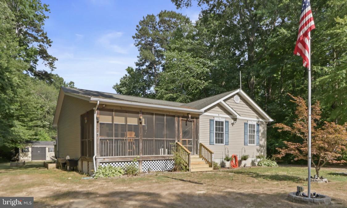 Coming Soon, June 11, 2026    Your Dream Home at 262 Rolando Drive, Colonial Beach, VA
Open House will be immediately available on Sunday 14, 2026 from 11:30 to 1:30!

Discover the tranquility of Potomac Shores in this charming three-bedroom, two-bath home, perfectly nestled on a generous, .29-acre lot that backs up to serene wooded trees, with 1,354 square feet of living space, this home offers both comfort and privacy in a vibrant community.

Spacious Open Floor Plan: Enjoy the seamless flow of the living, dining, and kitchen areas, perfect for family gatherings or entertaining.
Screened Front Porch: Relax in your front porch area, ideal for sipping morning coffee or unwinding in the evenings.
Renovated Decking: Newly renovated outdoor decking enhances your outdoor living experience.
Large Backyard: The expansive yard features a horseshoe pit for fun and games, along with a custom fire pit area for cozy nights under the stars.
Convenient Shed: A spacious shed provides ample storage, with the option to negotiate the lawn care equipment and golf cart.
Security System: The home is equipped with a security camera system for added peace of mind.

Community Amenities:
The Potomac Shores community offers an array of fantastic amenities:
Private Beach Access:Enjoy exclusive access to beautiful beach locations.
Community Center:  Engage with neighbors and participate in community events.
Boat Ramp and Dock: Perfect for boating enthusiasts, the community provides easy access to the water.

Located in the desirable Westmoreland County, this home is close to local attractions and recreational opportunities. Experience the charm of Colonial Beach with its quaint shops, dining options, and beautiful waterways. 

This is more than just a home; it's a lifestyle. Don't miss out on this incredible opportunity to live in a peaceful, water-oriented community. 

**Stay tuned for more details on this listing!**