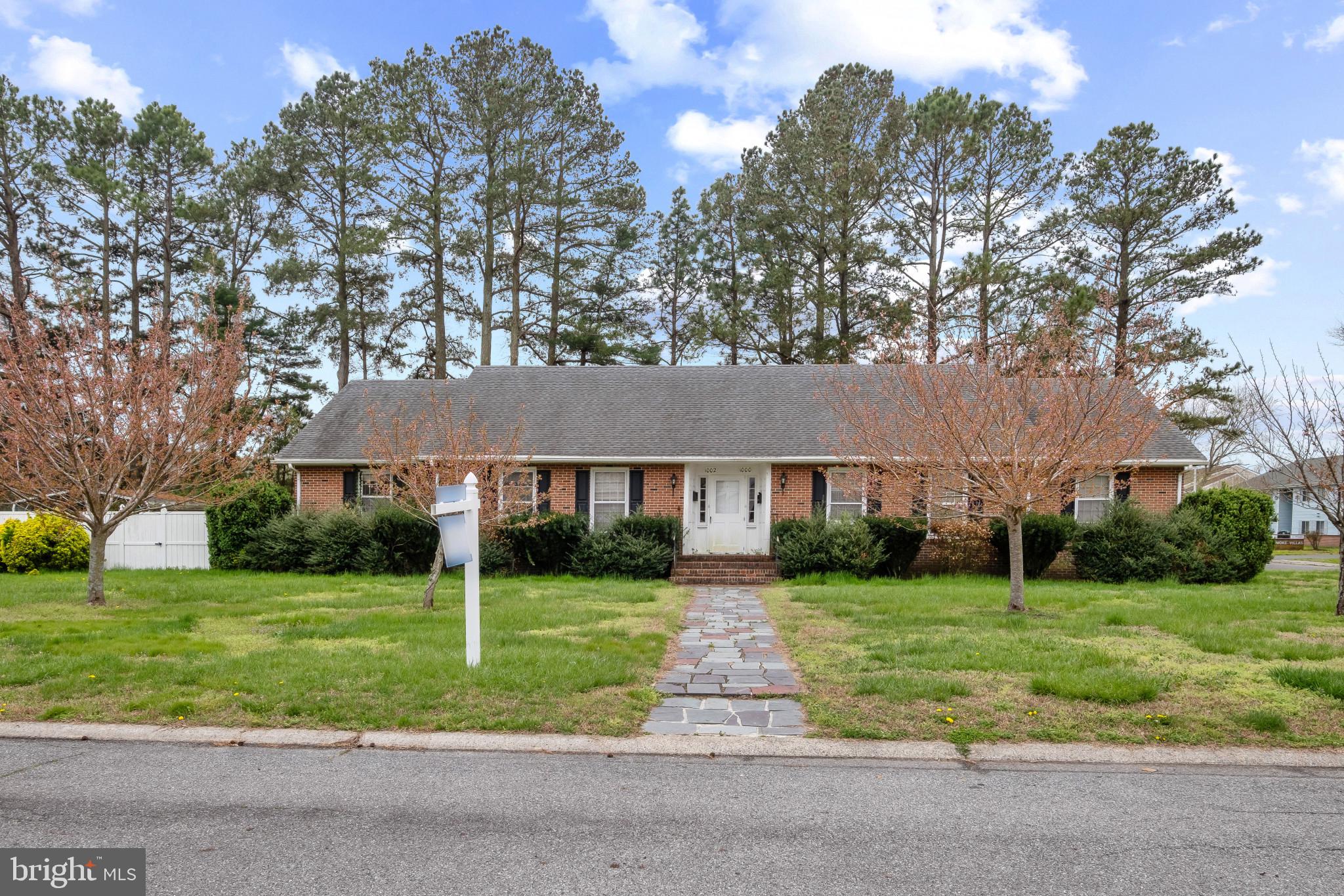 Unique Opportunity with Income Potential  

Discover endless possibilities with this one-of-a-kind property, offering flexibility, space, and value. This brick home is being sold AS-IS and features a separate adjacent unit, making it ideal for rental income, multigenerational living, or extended household needs.

The main residence offers a versatile layout with a living room and family room, two large bedrooms on the main level, and a full bath. Upstairs, you’ll find an additional bedroom, a bonus room perfect for a bedroom, office, or playroom, and another full bath—plenty of room to adapt to your lifestyle.

The second unit includes its own living room, dining area, nice-sized kitchen, two bedrooms, and a full bath, providing excellent potential as a rental unit or private living space for older family members or adult children.

Situated at the end of the street, the property provides added privacy and ample outdoor entertaining space. Whether you’re looking to invest, expand, or create a truly customized living arrangement—anything is possible here.

There are also three adjacent lots,  listed separately, offering exceptional outdoor space and future potential:
• One lot just over ½ acre
• Two additional lots each just over ¼ acre each
Schedule your showing and explore the possibilities today!