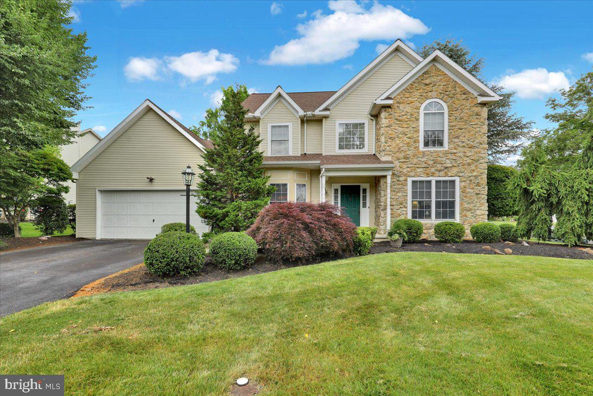 This single-owner corner property offers exceptional curb appeal and a warm, inviting atmosphere. Step inside and be greeted by the beautiful hardwood floors. The layout includes a formal dining room perfect for gatherings, a versatile formal living room that can serve as an office or den, and a convenient butler’s pantry.

The 1st floor family room features a cozy fireplace and opens directly into a stunning kitchen that was redone in 2018. 

Key kitchen specifications include:
  - Custom Cabinetry: Abundant storage with dovetail joints.
 - Premium Hardware: Soft-close drawers and cabinets throughout.
  - Surfaces: Durable solid surface countertops.
 - Tile backsplash
 - Pantry
 - Recessed lighting
  - Included: Stainless Steel Appliances: Electric oven/range, microwave, refrigerator and dishwasher.
 
Convenient 1st-floor laundry room and a half bath. Laundry includes the front load washer and dryer and utility sink.

The open staircase leads to the 2nd floor loft area, which offers a dedicated kid space or can be easily finished to create an additional bedroom. The second level also includes:

 The Primary Suite features:
  - Spacious walk-in closet for ample storage.
  - Updated primary bathroom equipped with two separate sinks and a fiberglass shower.
  - Coretec tile flooring.
  - 2 additional spacious bedrooms
  - Main full bathroom with tile shower and Cortec Tile flooring

The lower-level finished family room provides an additional gathering space, ideal for use by family members, children, or as an area for sports enthusiasts.

 The attached oversized two-car garage includes a utility sink, significant storage space, and a separate door providing direct access to the rear yard.  Power outage? Not a problem, the Generac generator with automatic switch stays!

Step outside to experience the ultimate in outdoor living. The exterior of this property is designed for both relaxation and entertaining, featuring:
  - Deck and Paver Patio: A spacious setup perfectly suited for your outdoor furniture.
  - Professional Landscaping: Mature greenery that provides a polished and established feel.
  - Peaceful Setting: The onsite pond creates a quiet, relaxing retreat right in your backyard.

You'll want to put this home on your list of homes to view!