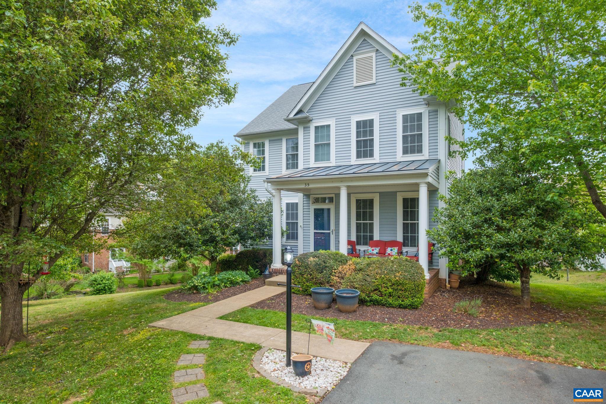 Perfectly positioned inside the desirable Spring Creek Community! Just a 5-minute walk to the sports club, swimming pool, playground, golf course, driving range and more, you will find 35 Piney Loop! With 2,338 square feet of thoughtfully designed living space, this residence blends comfort and style in every corner. Inside, discover an inviting open floor plan where gleaming hardwood floors flow seamlessly throughout. The spacious kitchen serves as the heart of the home, featuring a generous island perfect for casual dining and entertaining guests. Natural light pours through the living areas, creating a warm and welcoming atmosphere that feels like home from the moment you arrive. Out back, a rear deck provides the ideal setting for morning coffee or evening gatherings under the Virginia sky. The unfinished basement offers tremendous potential for additional living space, a home gym, or creative studio, the possibilities are yours to imagine. You'll enjoy easy access to Charlottesville's vibrant Downtown Mall and the prestigious University of Virginia, all just a scenic drive away. Come take a tour today!,Fireplace in Family Room