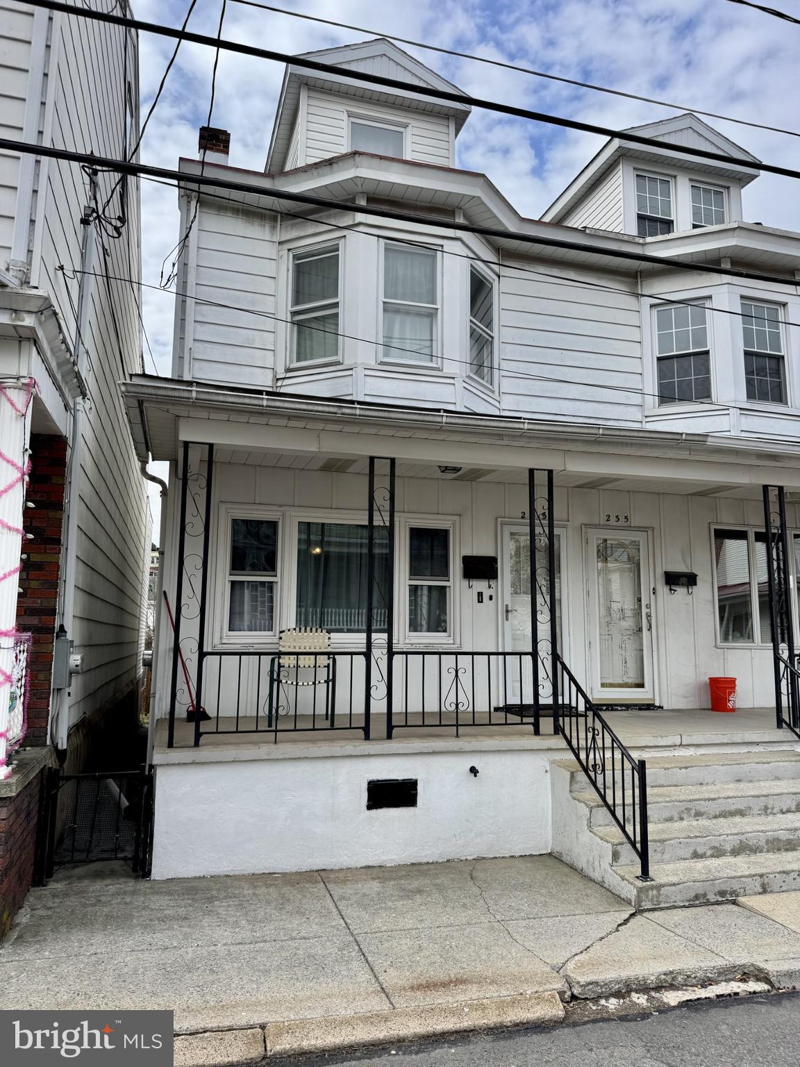 Welcome to 233 Carbon Street in Minersville, Pa.  You will be delighted with all of the room that this town home has to offer.  As soon as you walk through the front door, you will be delighted with the very spacious great room.  Then, the beautiful, remodeled kitchen with Oak cabinets.  Appliances stay. To the rear of the kitchen is a newer French door leading out to the spacious deck! Upstairs on the second floor, you will find a spacious master bedroom, a walk-in closet, a modern full bath with large shower and separate soaking tub, washer/dryer stay!  Another Bedroom, to the rear, nise-sized and private.  The third floor is heated, finished and could be another bedroom or use for storage.  The basement is full.  Newer oil burner and electric.  Call today for your private showing.