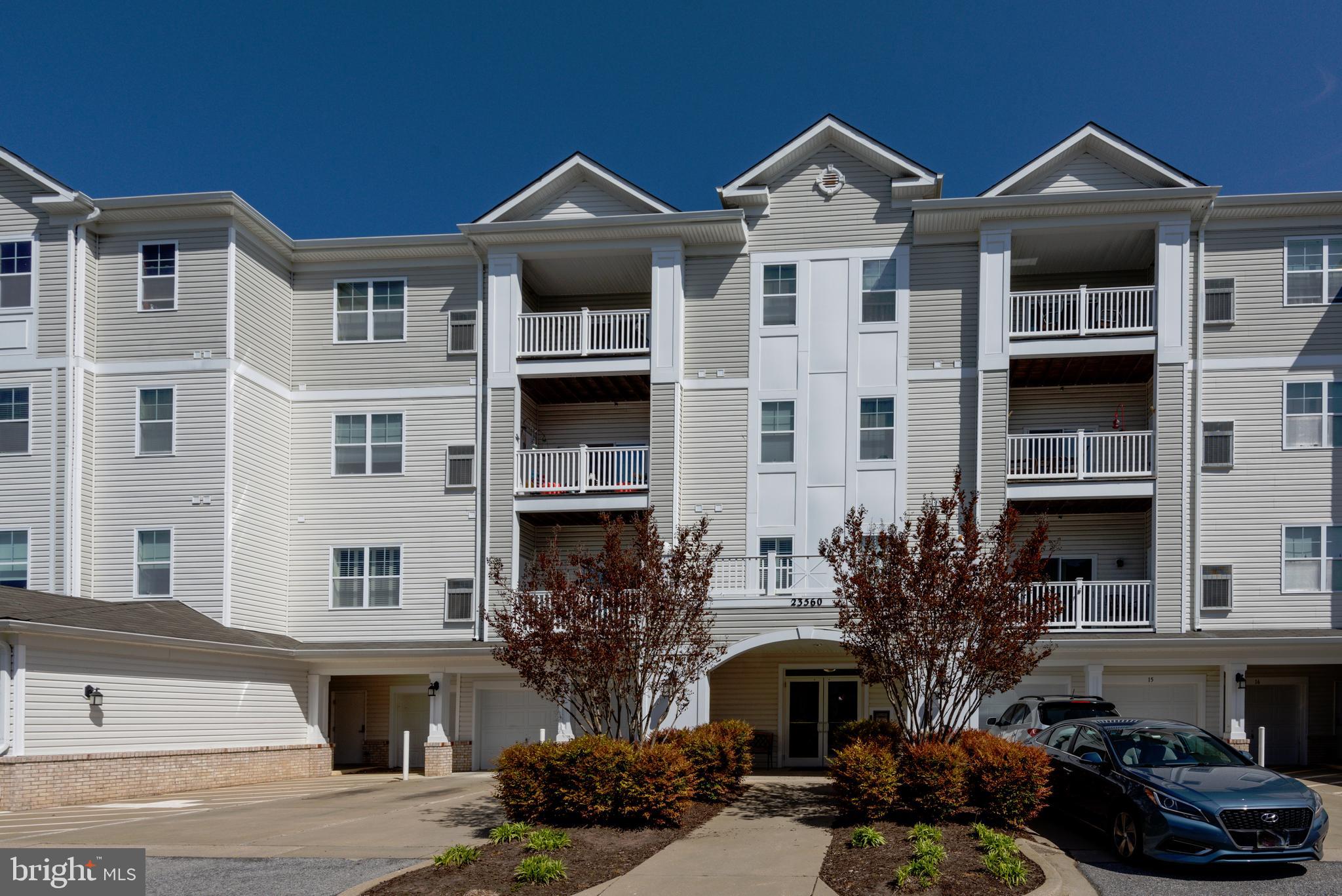 Spacious FIRST FLOOR Condo in the sought after Residences at Wildewood.  Nice open floor plan features a kitchen with pantry, plenty of cabinet space and a breakfast bar.  There is a nice dining area off the open living room, with sliding doors to the patio looking out on the lawn.  The primary bedroom has a small sitting area, large closets and primary bath with double sinks and walk-in shower. The second bedroom has it's own bath. (Door from the hall also).  There is a laundry, roomy enough for full size appliances, however, only the AS IS dryer conveys.  The garage, #15, is directly across the hall from the unit - very easy access.
These condos within walking distance to Harris Teeter, restaurants, Starbucks and Urgent Care! Close to all the California shopping and PAX!