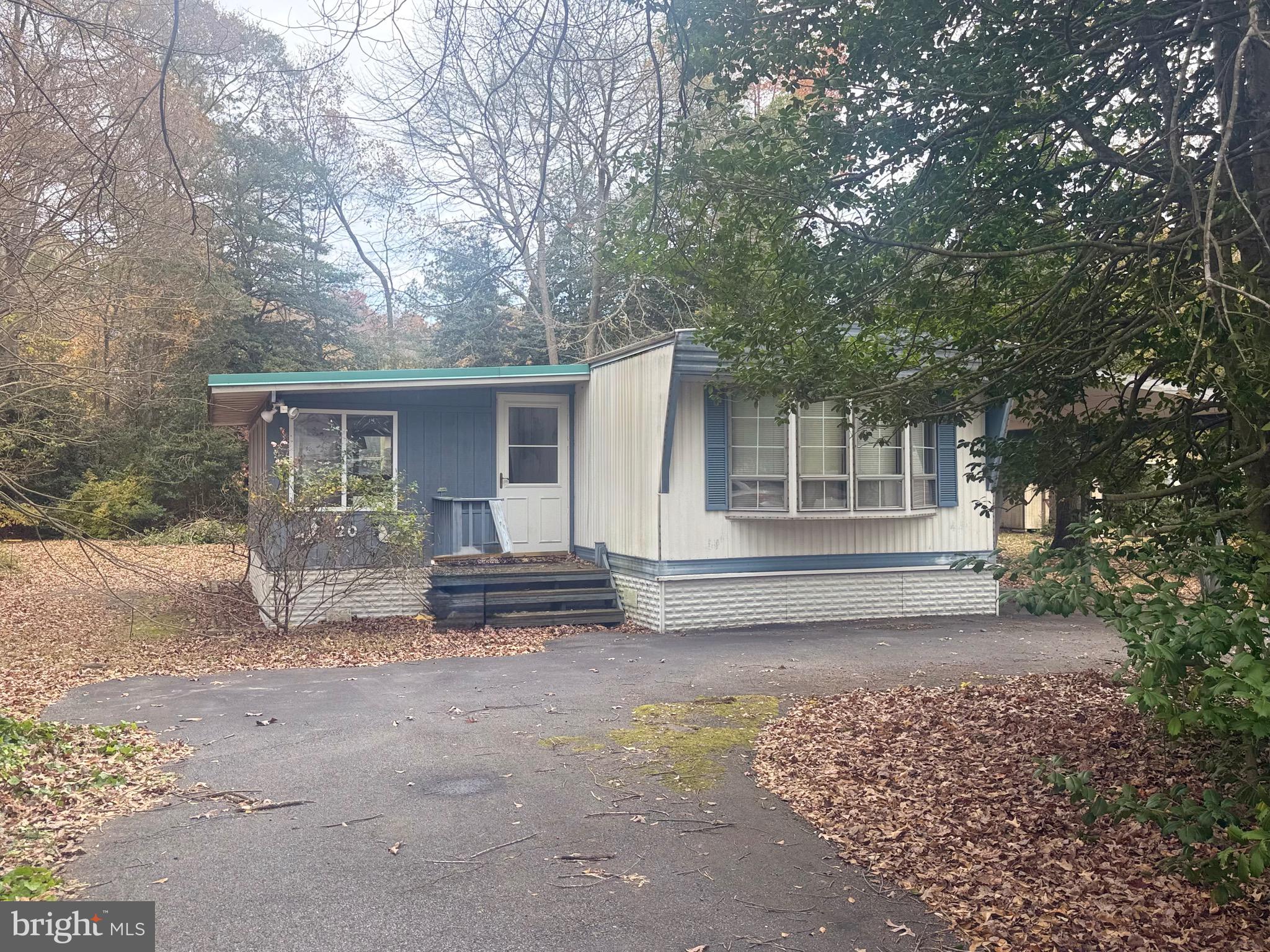 This well-kept 3-bedroom, 2-bath home is a rare find—offering comfortable coastal living without the burden of lot rent. Enjoy abundant indoor–outdoor space with a large enclosed sunroom and an enclosed rear porch featuring an outdoor shower and private dressing area. A rear shed provides added storage for bikes, beach gear, and tools.

Located just 11 miles from Lewes Beach, you’ll be close to all the dining, shopping, and activities the resort area has to offer. Photos will be uploaded soon.

Bonus Opportunity: The lot directly next door—22 Patterson Drive (MLS# DESU2100650)—is also Coming Soon. Secure extra privacy, create additional outdoor living space, or consider adding a pole barn. A rare chance to expand your coastal retreat!
