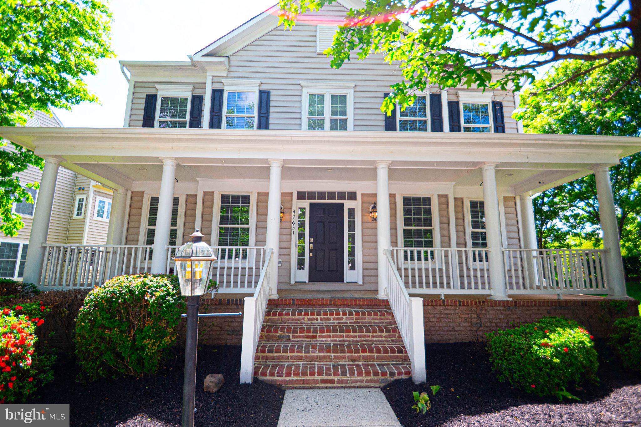 A rare opportunity in Brambleton! Tucked away on a peaceful, private homesite, this beautifully refreshed Craftsman offers  stylish, move-in ready living. From the moment you arrive, the charming front porch sets the tone, while the backyard is designed for relaxing and entertaining with a custom paver patio, built-in seating wall, outdoor speakers, and newly refreshed landscaping.

This home has been extensively updated and meticulously maintained with major improvements already completed for the next owner’s peace of mind—including a full roof replacement (2019) and a newer HVAC system (just 2 years old). The entire home has just been freshly painted from top to bottom—including walls, ceilings, trim, front pillars, and front door—creating a bright, modern feel throughout.

Inside, you’ll find brand new carpet in all bedrooms and the basement, updated recessed lighting, and a beautifully refreshed kitchen featuring granite countertops, newly painted cabinetry, a new GE dishwasher, updated backsplash, and stylish new gold faucet and hardware. All kitchen and bathroom cabinets have been freshly painted, complemented by modern fixture upgrades including gold finishes in the primary bath, black fixtures in the secondary bath, and brass accents in the lower level bath.

Additional highlights include two sets of laundry machines (main level and basement), EV charger wiring already installed, and a freshly painted garage. The exterior has been fully refreshed with pressure washing, new sod and grass seeding, trimmed landscaping, new mulch throughout, updated brick front steps, and regrouted patio pavers. Even the driveway is being touched up with fresh tar for a clean finish. A brand new kitchen window has also been ordered and is scheduled for installation in mid-May.

Upstairs, the spacious owner’s suite offers dual walk-in closets, a sitting area, and a spa-like bath designed for relaxation. The finished lower level provides incredible flexibility with a large rec space, additional bedroom, full bath, and ample storage.

An additional 700 square feet of unfinished space offers endless potential for future expansion, storage, or customization.

All of this in a vibrant Brambleton community offering pools, parks, trails, and top-rated schools.
This one truly has it all!