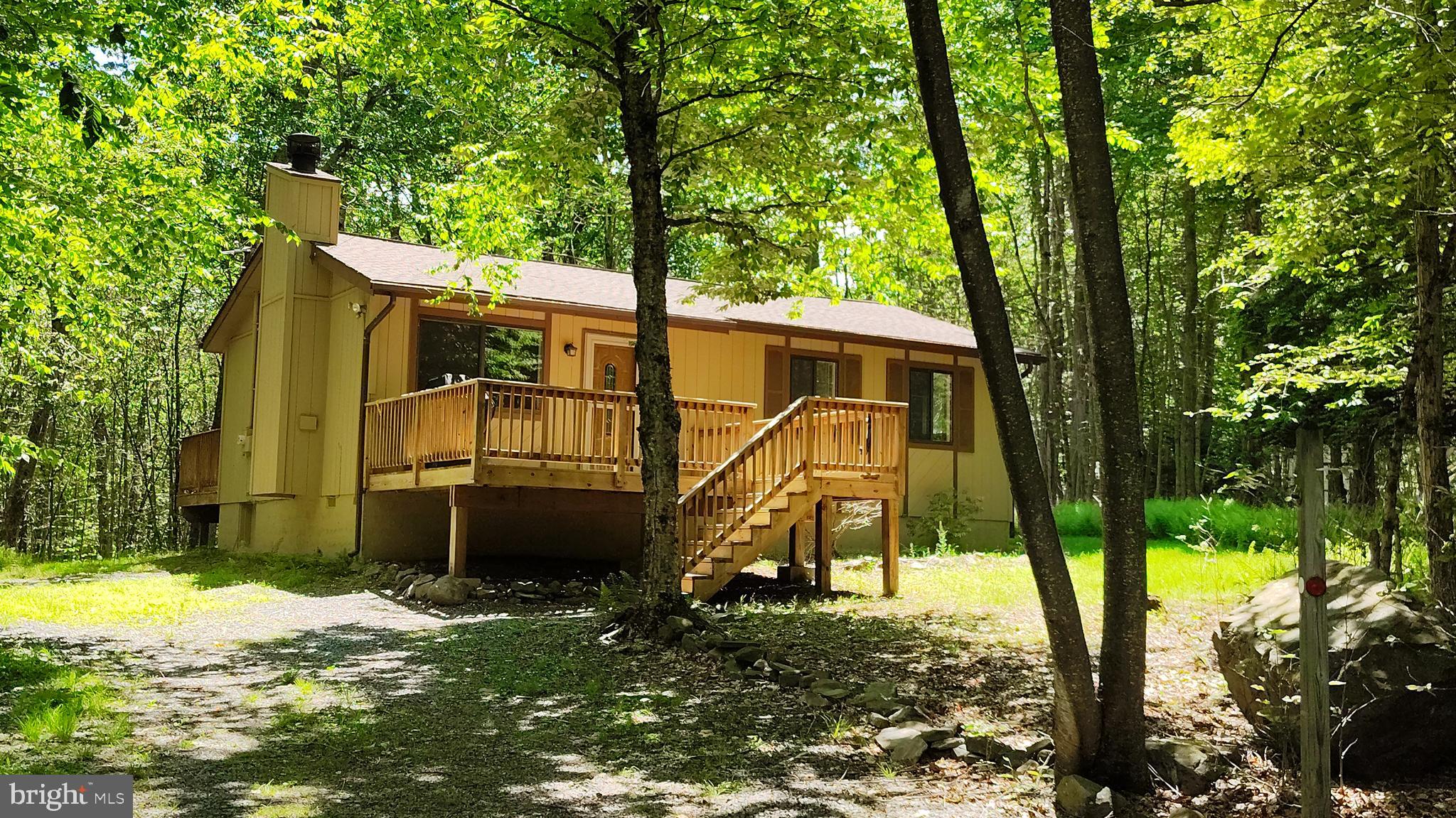 Adorable Raised Ranch in Locust Lake Village - Gold Star Community

MOVE-IN READY, FRESHLY PAINTED, NEW FLOORS, this ADORABLE RAISED RANCH sits on an oversized lot surrounded by mature trees, offering wonderful privacy and two spacious decks perfect for entertaining, relaxing, and summer barbecues. 

Just a short walk away, Locust Lake Village's East Lake provides tennis and pickleball courts, volleyball and basketball areas, a children's playground, a picnic spot with a sandy swimming beach, and a beautiful trout-stocked lake. 

Locust Lake Village is a proud Gold Star Community known for year-round family recreation, including its own small ski slope when Mother Nature brings the snow. Come live the Pocono life!