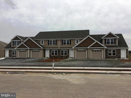 Great new floorplan that offers a very open floorplan and large rooms. Home has a daylight basement, 1 car garage, laundryroom on second floor. HOA includes lawn care and snow removal.