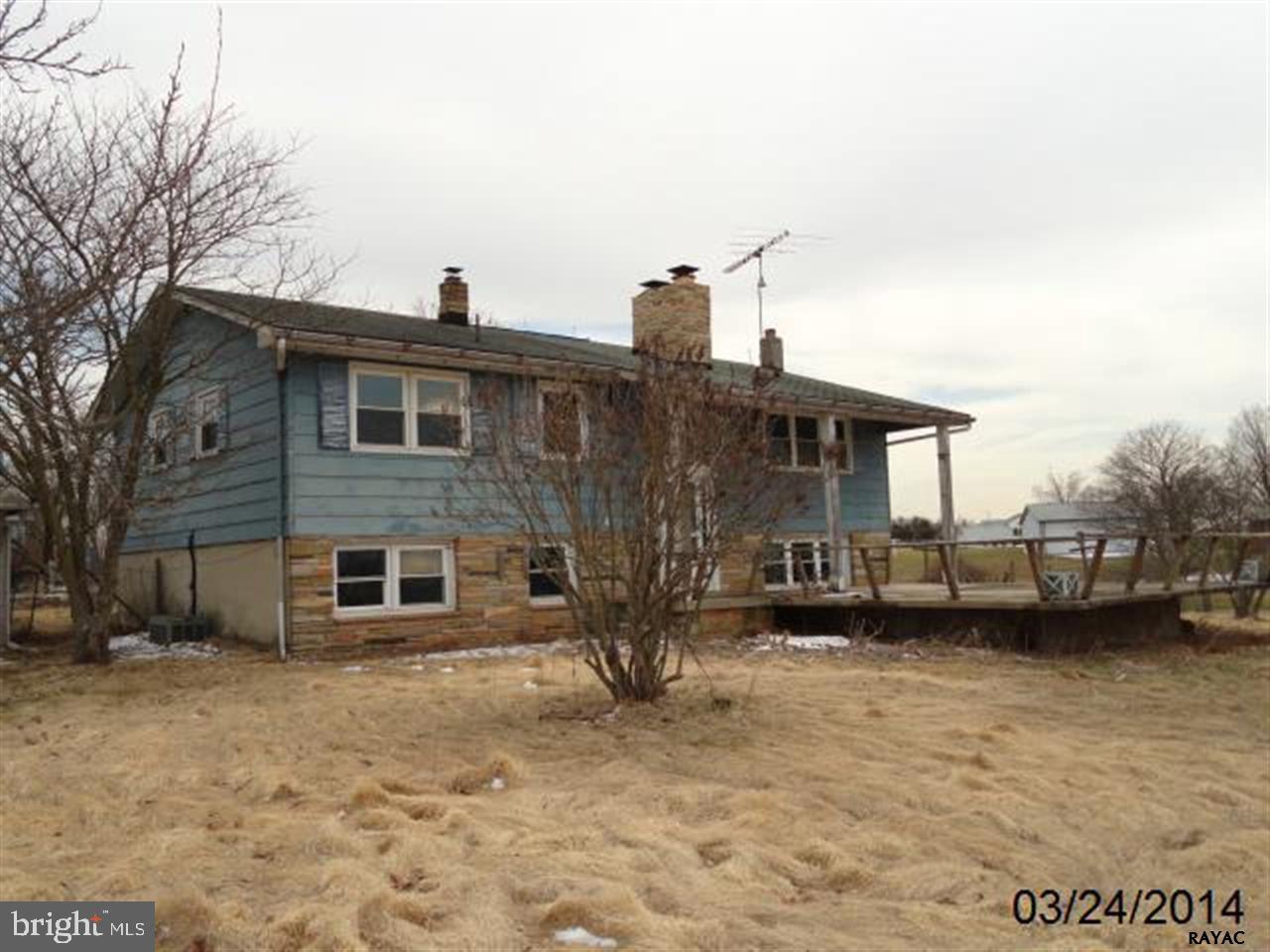 If you're looking for a house w/potential, this is it!!  Home needs redone from top to bottom.  Showing some finished arein in basement, but everything needs redone.  Situated on a 2+ acre lot, this property has 2 FPs, 4 potential BRs, 2 Baths, out buildings w/workshop and more.  Located right before the Maryland State Line.