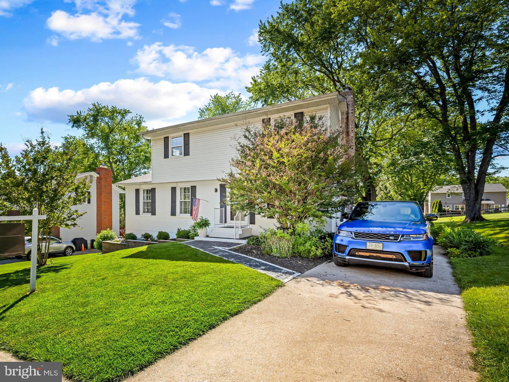 Welcome to an architectural showpiece custom-designed by a premier NYC interior designer renowned for curating luxury residences for professional athletes across the NFL and NBA, including players for the Ravens, Giants, Eagles, Jets, Patriots, Falcons, Nets, Celtics, Cavaliers, and Knicks.

No expense was spared in this exceptional home, featuring a spectacular open-concept main level highlighted by a designer kitchen and dining area with seamless flow into the family room . The upscale kitchen is equipped with a premium smart appliance suite, fully warrantied through October 2027.

The family room showcases a modern white-painted brick fireplace converted to an energy saving pellet stove, high-end Audioengine wall-mounted speakers, and a sleek matte black ceiling fan. The living room features integrated smart LED ambient lighting, designer gallery art lighting, and premium Silkstone marble baseboard detailing throughout. Designed with media enthusiasts in mind, the home conveys with six heavy-duty flat-screen wall mounts and custom masonry speaker mounts integrated into the fireplace.

The designer wet bar is anchored by a seamless marble slab countertop and built-in glass rinser. Adjacent to the bar, the powder room features a dramatic marble waterfall vanity, integrated shelving, and custom window framing, all hand-carved from a continuous matching slab of marble.

You'll love the open-rafter three-season screened porch with integrated perimeter lighting—perfect for enjoying long summer days and evenings. The expansive rear yard adjoins Springdale Community open space, extending the view and enhancing privacy. A brand-new Trex composite side deck provides additional outdoor living space and direct access to the family room.

Upstairs, the primary suite enjoys its own recently updated full bath while the spa-inspired guest bath features floor-to-ceiling marble tile, a deep soaking tub, and a seamlessly integrated walk-in shower. The upper level also includes a dedicated laundry suite with premium smart front-load washers and dryers, fully warrantied through October 2027, a boutique hotel-inspired guest suite with built-in vanity and backlit smart mirror, and a private executive home office/bedroom.

The walk-out lower level is supported by a 200-amp electrical heavy-up and offers a spacious recreation room, newly added half bath, and generous storage/utility space.

6 Thurkhill Court combines exceptional design and everyday functionality in the heart of Springdale, a community known for its neighborhood trails, community pool, and year-round events. Conveniently located just minutes from Hunt Valley, I-83, I-695, shopping, dining, and everyday conveniences.

Please note: the kitchen refrigerator does not convey. A $1,000 appliance credit will be provided to the purchaser at closing for their own selection.