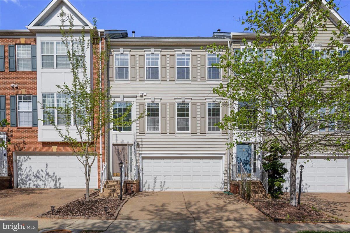 *Open House for Sunday, 4/26 has been cancelled. An offer has been accepted* Don't miss this beautifully maintained, light-filled and spacious town home in the desirable Great Falls Chase community! The main level is thoughtfully designed for both everyday living and entertaining, featuring spacious living and dining areas, a half bath, and a coat closet. The large kitchen includes an island, room for a table, a gas fireplace, and access to the oversized deck. Step outside to enjoy peaceful views of the private common area - perfect for relaxing or hosting guests. Upstairs, you’ll find 3 bedrooms, 2 full baths, and conveniently located washer/dryer. The spacious primary suite boasts high ceilings, abundant closet space and a luxurious en suite bathroom with soaking tub, walk-in shower and double sink.  The entry level basement includes a half bath and access to the 2 car garage and the fenced backyard.  This flexible space can be used as a home office, playroom, TV area and/or gym. Updates include roof (2014), HVAC (2020), windows (2023), dishwasher (2023), stove & refrigerator (2025), water heater, paint and carpet (2026). Prime location near Algonkian Regional Park, Dulles Town Center, Reston Town Center, the Washington & Old Dominion trail, Great Falls Park, and Dulles International Airport, with easy access to commuter routes into DC or out to Loudoun County’s breweries and wineries. Great Falls Chase residents enjoy fantastic community amenities including a pool, playground, tennis courts, dog park, basketball courts, and clubhouse.

Welcome home!