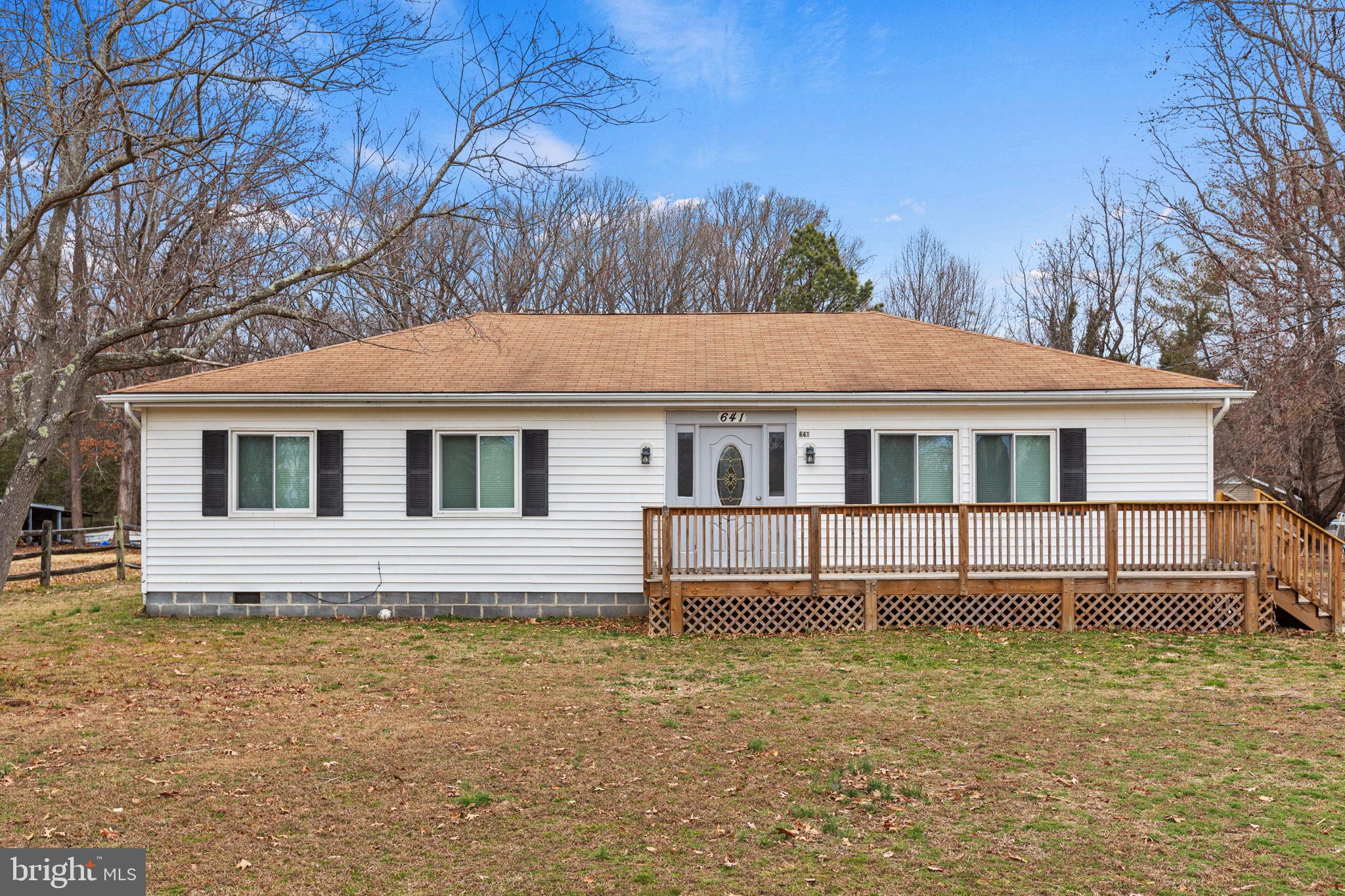 Welcome home to this beautifully maintained 3-bedroom, 2-bath rambler situated on nearly an acre in a quiet and peaceful area of Colonial Beach. This inviting home offers comfortable one-level living with abundant natural light, generously sized bedrooms, and a spacious layout designed for everyday living.

Recent updates throughout the home provide both style and peace of mind. The kitchen was fully remodeled in 2024 with new cabinetry, granite countertops, and flooring, creating a modern and functional space for cooking and gathering. Both bathrooms were updated in 2025 with new vanities, flooring, and a new tub. Additional improvements include engineered flooring throughout the home (2018), replacement windows and kitchen door (2020), updated insulation in both the attic and crawlspace (2020), and a fully replaced HVAC system with new equipment and supply lines (2014). The kitchen appliances have also been replaced, and tamper-resistant outlets were installed for added safety.

Outdoor living is just as enjoyable with a newly built front porch and rear deck—perfect for relaxing, entertaining, or simply enjoying the level yard and open space. Great storage shed in the backyard.

With no HOA, this property offers both privacy and flexibility while remaining conveniently located—approximately 30 minutes to Dahlgren, 35 minutes to Bowling Green/AP Hill, and under an hour to Fredericksburg, with easy access to Maryland via the Harry Nice Bridge.

Homes with this combination of space, updates, and location do not come available often. Schedule your showing today and come see everything this charming property has to offer.