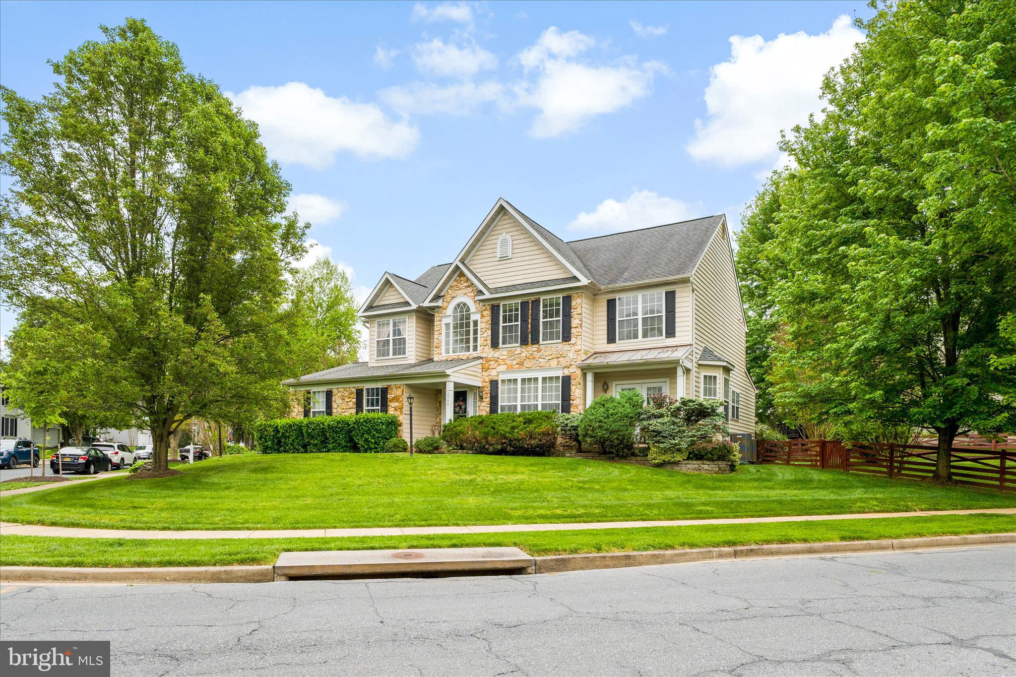 Welcome to 1700 Dearbought Dr, where charm, space, and convenience come together seamlessly. Situated on a beautifully landscaped .29-acre corner lot, this stunning stone-front home offers timeless curb appeal and a fully fenced backyard, perfect for entertaining, pets, or simply enjoying your own private outdoor retreat. Enjoy outdoor living at its best with a large deck off the back of the home, ideal for hosting or unwinding at the end of the day. Step inside to find original hardwood floors flowing throughout the main level and a unique sunken living room that adds character and warmth to the space. The heart of the home is the open-concept kitchen, thoughtfully designed for both everyday living and hosting, and featuring a new water filtration system (2025) for added peace of mind. Upstairs, you’ll find the primary suite and 3 spacious bedrooms, along with the laundry room, offering plenty of room to grow, work, and relax. The finished basement provides even more versatility with a large open layout, perfect for a rec room, home gym, or additional living space, along with an additional room and a full bathroom that make it ideal for guests, a home office, or multi-generational living. This home has been thoughtfully updated over the years, including two new AC units (2025), a roof that is just five years old, the majority of windows replaced, and a new sliding glass door (2024). Beyond the home itself, Dearbought offers incredible community amenities, including a neighborhood pool and access to a scenic walking trail along the Monocacy River, perfect for enjoying the outdoors right in your own neighborhood. Conveniently located just minutes from major shopping, dining, and commuter routes including Rt 15 and 26, this location makes everyday living effortless.