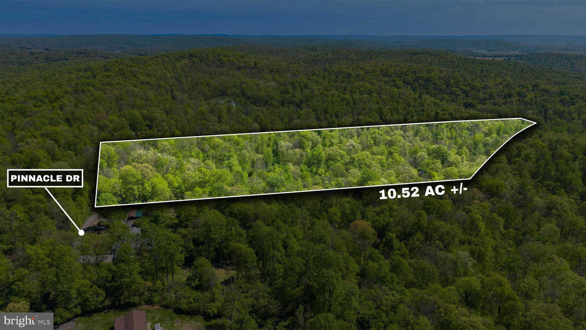 Discover your own wooded paradise in Berks County—10.5± acres of pure Pennsylvania beauty. Ideally located near Adamstown and Reading with quick, convenient highway access, this property offers the perfect blend of seclusion, natural charm, and proximity to everything you need.

Berks County is known for its rich history, rolling landscapes, and the unique character of Pennsylvania Dutch Country—yet it also offers easy access to the amenities of the Philly suburbs and the Lehigh Valley. This parcel sits right in the middle of it all, giving you the best of every world.

The land is fully wooded, featuring a well‑established internal road system that makes exploring the property effortless. While there is currently no well or perc, the soils are consistent with nearby properties that support septic systems, suggesting favorable perc potential for future development.

With RC zoning, residential construction is permitted along with a variety of other uses—making this an exceptional opportunity to build your dream home, create a private retreat, or simply enjoy over 10 acres of wooded serenity for recreation, hiking, hunting, or relaxation.

Properties offering this level of privacy, natural beauty, and convenience are rare in Berks County. Don’t miss your chance to own a slice of wooded bliss just minutes from major amenities. Schedule your private tour today.

Zoning is RC (Rural Conservation) allowing for ultra-low-density residential development 
consistent with the purposes of this district and compatible with existing land uses. PERMITTED USES: All  forms  of  agriculture,  except  intensive  agriculture,  pursuant  to 
§ 27-312. Single-family detached dwellings. Municipal uses forestry. Non-Tower Wireless Communication Facilities, subject to §27-315 of the Brecknock Township Zoning Ordinance. [Ord. 2017-190]