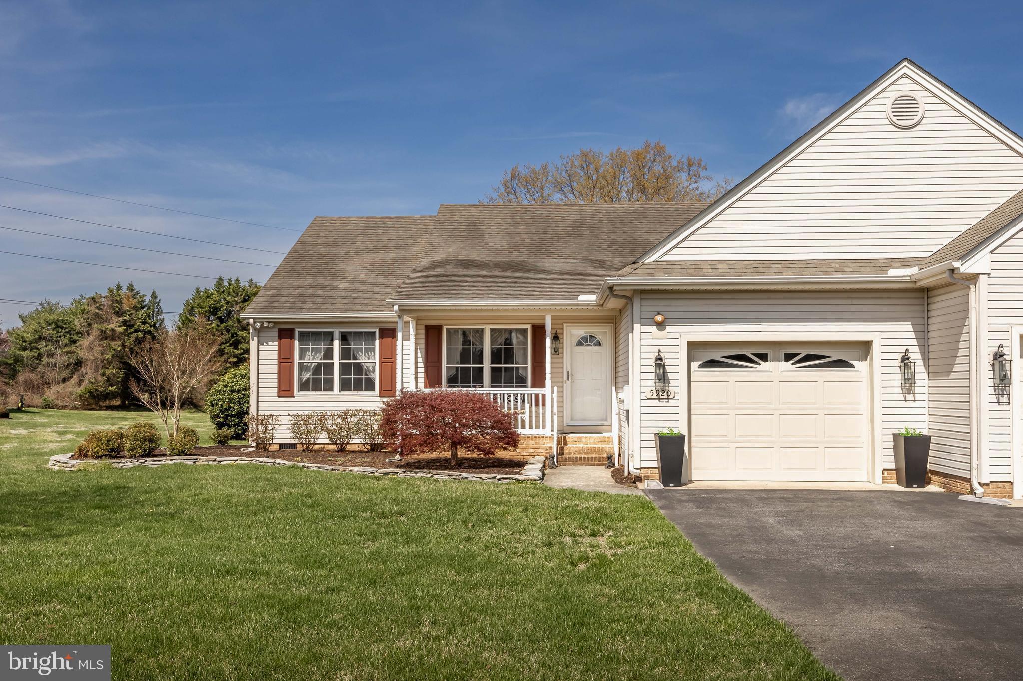 Located in the 55+ section of Sleepy Hollow, this immaculate duplex at 5920 Tappan Lane offers comfortable, low-maintenance living in a convenient Salisbury location. With three bedrooms and two full baths, the layout provides flexible space for guests or a home office, with hardwood and tile flooring throughout for easy care. An updated kitchen features granite countertops, a custom tile backsplash, stainless appliances, and a gas range, while crown molding and updated light fixtures add a clean, finished, and upscale feel. A standout feature is the sunroom, a bright and inviting space with a gas fireplace—perfect for relaxing year-round. The NEW HVAC will provide peace of mind to its new owner. Out back, the composite deck extends your living space and overlooks a fenced yard that offers added privacy and usability. Positioned toward the rear of the community, the home also backs to the pond, adding a quiet, scenic touch. Pemberton Park is just minutes away, and you’re conveniently close to shopping, dining, Tidal Health, and everything Salisbury has to offer.  Move-in ready and easy to enjoy—schedule your showing TODAY!