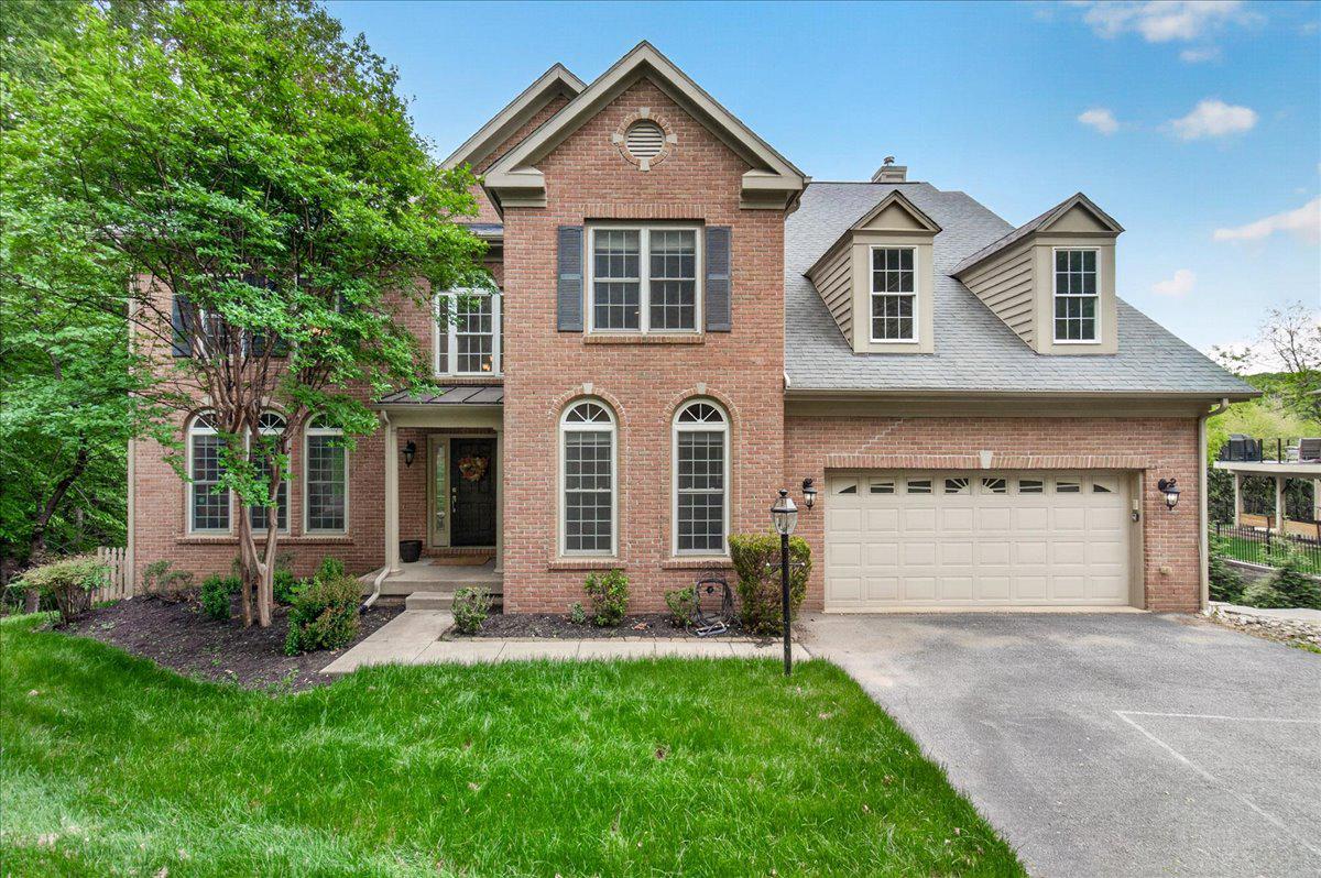 Gorgeous Lake Linganore Colonial with Seasonal Water Views!!

Welcome to 9710 Woodfield Court, a spacious and elegant 5‑bedroom, 4.5‑bath colonial tucked into a private, wooded setting in the highly sought‑after Woodridge at Lake Linganore. This beautifully maintained home offers over 5,000 sqft of living space across three fully finished levels, blending comfort, sophistication, and functionality throughout.  

The main level showcases hardwood floors, warm paint tones, and an open yet refined layout ideal for everyday living and entertaining. The gourmet kitchen features granite countertops, cherry cabinetry, stainless steel appliances, a center island, and a bright breakfast area, flowing seamlessly into the family room with fireplace. Formal living and dining rooms, plus a main‑level office, provide additional versatility.  

Upstairs, the expansive primary suite offers a private retreat with a luxury bath and walk‑in closets, while additional bedrooms are generously sized - including one en‑suite bedroom with its own private full bath. The finished walk‑out lower level includes the 5th bedroom, full bath, rec room, wet bar, and flexible entertaining space.  

Enjoy outdoor living with two‑level composite decks connected by a spiral staircase, overlooking a serene natural setting with seasonal water views and exceptional privacy.

Residents of Lake Linganore enjoy incredible amenities including pools, beaches, trails, sports courts, and more—all conveniently located near downtown Frederick, I‑70, and major commuter routes.