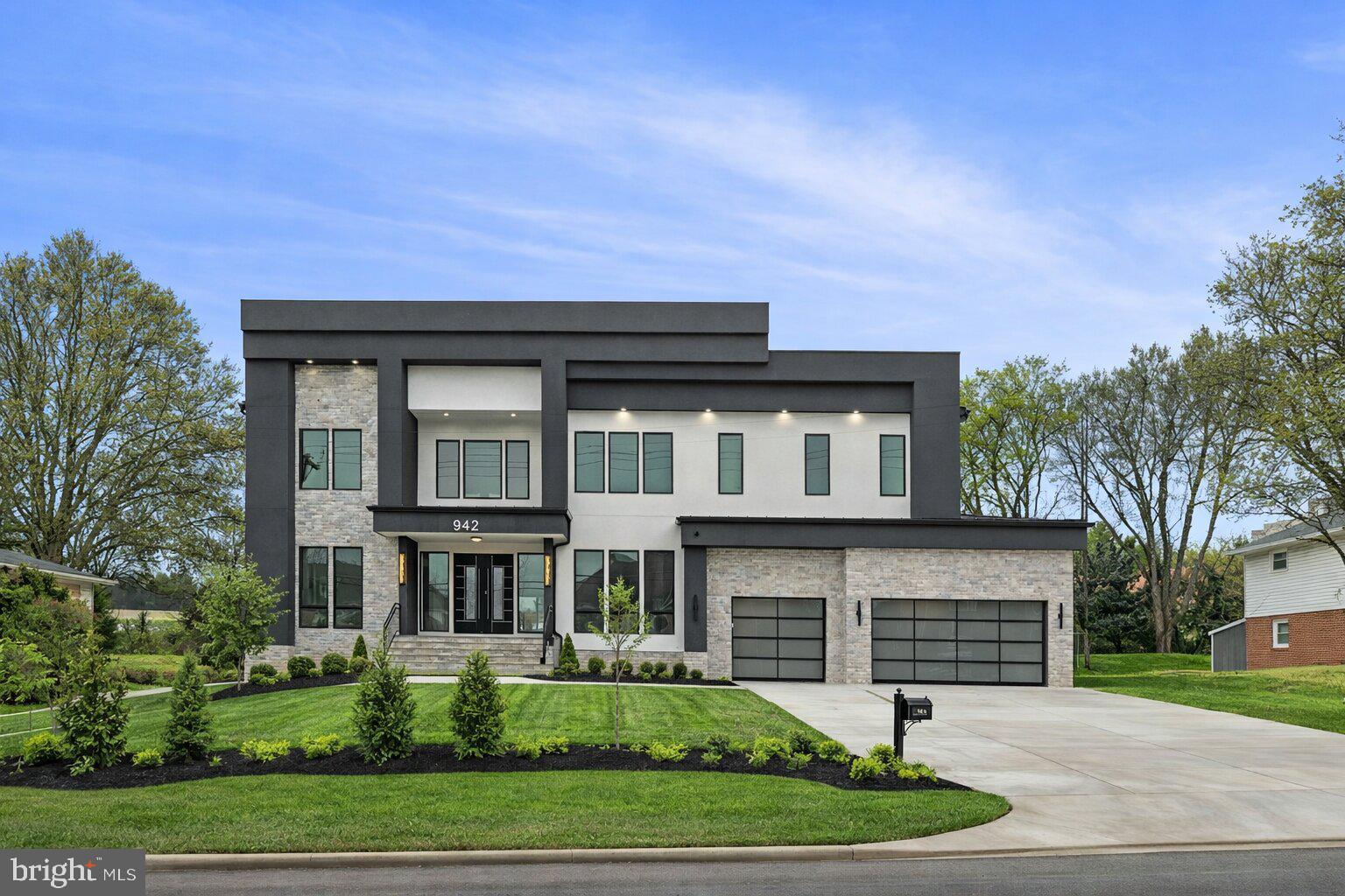 An extraordinary custom estate By KUL HOMES offering architectural distinction, refined craftsmanship, and uncompromising luxury. Thoughtfully designed with grand scale and exceptional flow, this residence is set on a private almost half acre lot backing onto lush greenery, creating a serene and exclusive retreat.
A striking open foyer makes a dramatic first impression, immediately showcasing the home’s sophisticated design and exquisite finishes. An integrated elevator shaft ensures seamless future accessibility. The expansive formal dining room is designed for unforgettable gatherings, while a private office offers an elegant and quiet workspace.
At the heart of the home lies a chef’s dream kitchen, curated with premium finishes and designed for both beauty and performance. The fully equipped spice kitchen allows for effortless entertaining and elevated culinary experiences. A main-floor bedroom paired with a full bathroom provides an ideal guest suite or multigenerational living option, offering privacy and comfort without compromise.
Every detail on this level has been meticulously considered to balance grandeur with warmth, creating spaces that feel both impressive and inviting.
The upper level is a showcase of refined comfort, featuring five generously sized bedrooms, each complete with its own luxurious ensuite bathroom. A beautifully designed loft serves as a cozy family lounge—perfect for relaxed evenings or intimate gatherings.
The owner’s suite is a statement of luxury and tranquility, offering expansive proportions and a lavish spa-inspired bathroom designed as a personal retreat. This serene space invites relaxation with a timeless, hotel-caliber ambiance.
The fully finished basement transforms the home into a complete lifestyle destination. Designed for entertainment and recreation, it features an expansive recreation room, a dedicated media room for cinematic experiences, and a private gym space for daily wellness. This level is ideal for hosting, unwinding, or creating unforgettable moments with family and friends.
Ideally situated near Tysons Corner, the home offers effortless access to major commuter routes, making daily travel seamless. Adding to its exceptional appeal, all three schools—elementary, middle, and high—are within walking distance, a rare and highly desirable convenience. This prime location delivers the perfect balance of privacy, accessibility, and everyday luxury. Some exterior photos have been edited to remove snow.