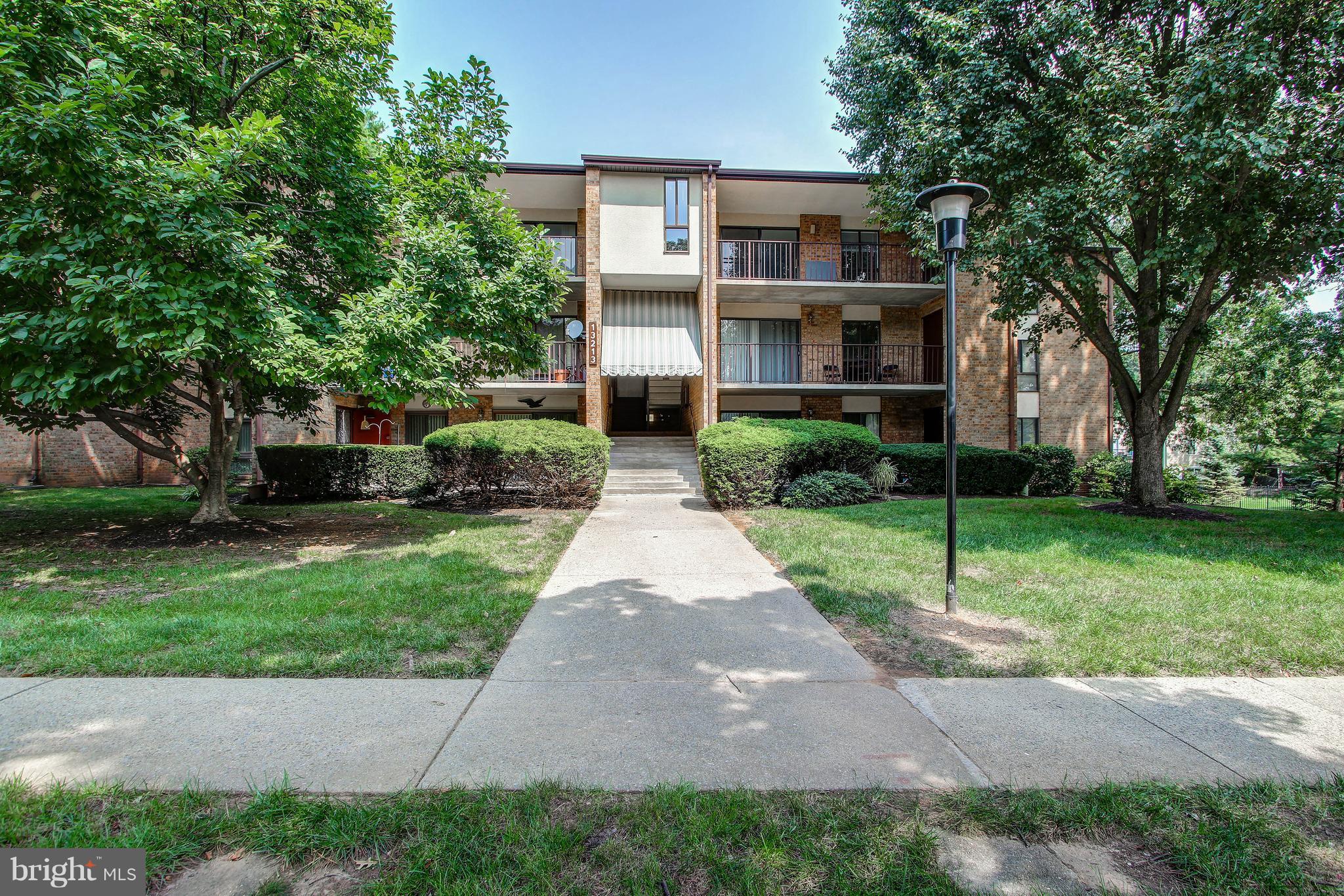 Spacious condo in Germantown! This unit features 2BR/1BA with assigned parking. Enjoy open concept living and dining room with walk-out to large balcony overlooking lush common grounds. Bright eat-in kitchen with fireplace, granite counters and lots of storage space. Large MBR with double closets and one is a walk-in! Condo fee includes water/sewer and location on top floor offers peace and quiet.
