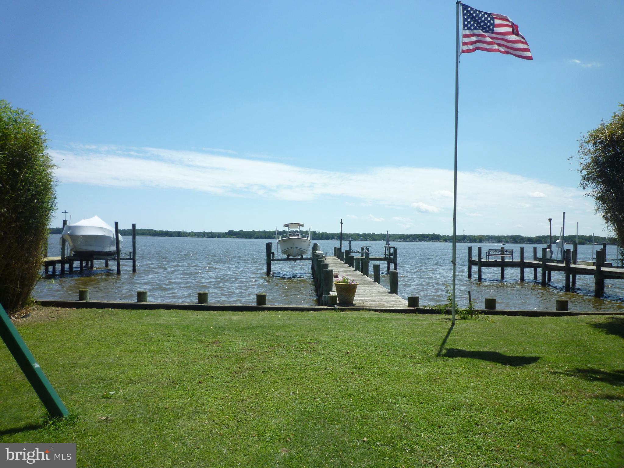 OPEN HOUSE EVERY DAY, call for times. Bright and spacious, recently updated, 2 story WATERFRONT  home on the Back River in highly desirable Wildwood Beach waterfront community. 1700-1800 sf (tax records incorrect - it does not reflect the back addition) updated bungalow with new roof, SS appliances, quartz countertops kitchen and bathroom, new insulated siding, new 100' pier w/boat slip and jet ski lift, 50 amp RV electrical hook up, 1 car garage, additional off street parking for 4-5 cars and the location to die for.  Recent updates includes flooring, counters, appliances, paint, etc etc. This home is in a secluded community on a dead end and quiet street with almost no traffic and surrounded by 100s of acres of protected conservation woods, golf course and a local park and a museum. 3 min drive to the golf course and 5 min drive to the local public beach, recreation and sailing center. The water here is perfect for crabbing and fishing and hard sand bottom is ideal for swimming. And did I mentioned that the river has no speed limit so jet skies, speedboats and all kind of other fast boats are welcome! Also it is located within 10 minute drive to MARC Train Station and 3 minute boat ride to Hart-Miller Island boating recreation area. Public water and sewer with additional working well for your extra gardening needs.
MOVE INTO THIS HOUSE AND WE WILL BUY YOURS FOR CASH, or sell it for free, Call for details. Please do not visit the property without an appointment: trespassing is illegal and it is also invasion of privacy. Not even the front yard.