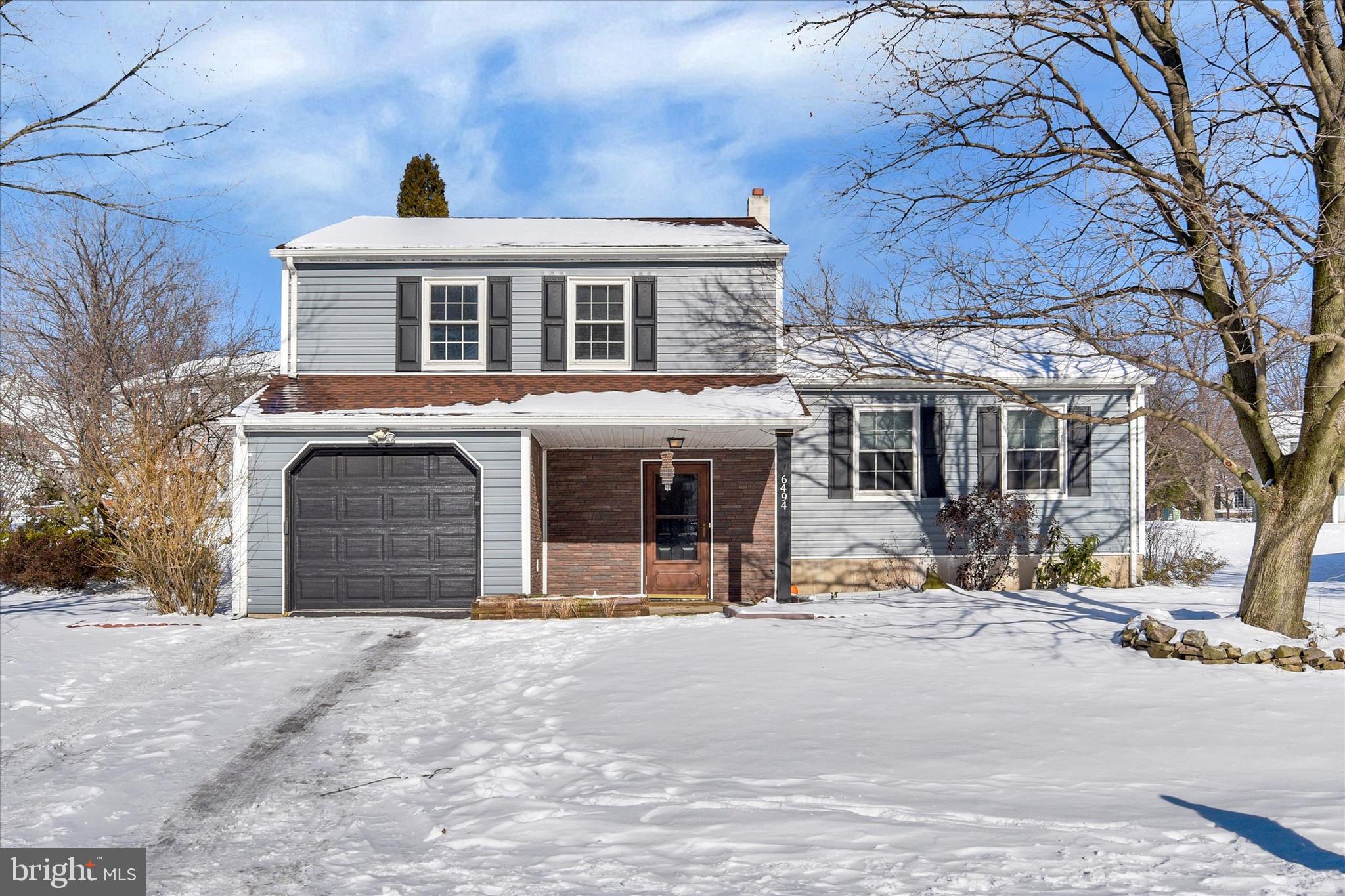 Step into this wonderfully cared-for home in the beloved Heatherfield Community! As you enter, you'll be welcomed by a tiled foyer, complete with a spacious closet for all your storage needs. The large family room awaits with its cozy LVP flooring and a charming fireplace, perfect for those chilly winter evenings. Open the sliding doors and find yourself in the ample backyard, featuring a brick oven for crafting the most delicious pizzas – an outdoor haven for your barbecues and entertaining.
The main level is complemented by a 3/4 bathroom, boasting a tastefully tiled shower. Move up a few steps to discover the living and dining rooms, showcasing durable LVP flooring, and a kitchen with its stylish tiled flooring. Journey a bit further up to find three bedrooms and another full bathroom. This home has seen numerous updates done by the previous owner, from a new roof, siding, water heater, and furnace, to the A/C unit – ensuring a hassle-free move-in.
Adding a touch of modern elegance, the interior walls are painted in a soothing gray paint, giving the whole house a contemporary feel. Not to mention the updated baseboard moldings for that extra touch of refinement. Conveniently located close to the community pool, tennis courts, and basketball courts, and with easy access to highways, restaurants, walking trails, and parks, this home is not just a place to live; it's a haven to enjoy the good things in life!