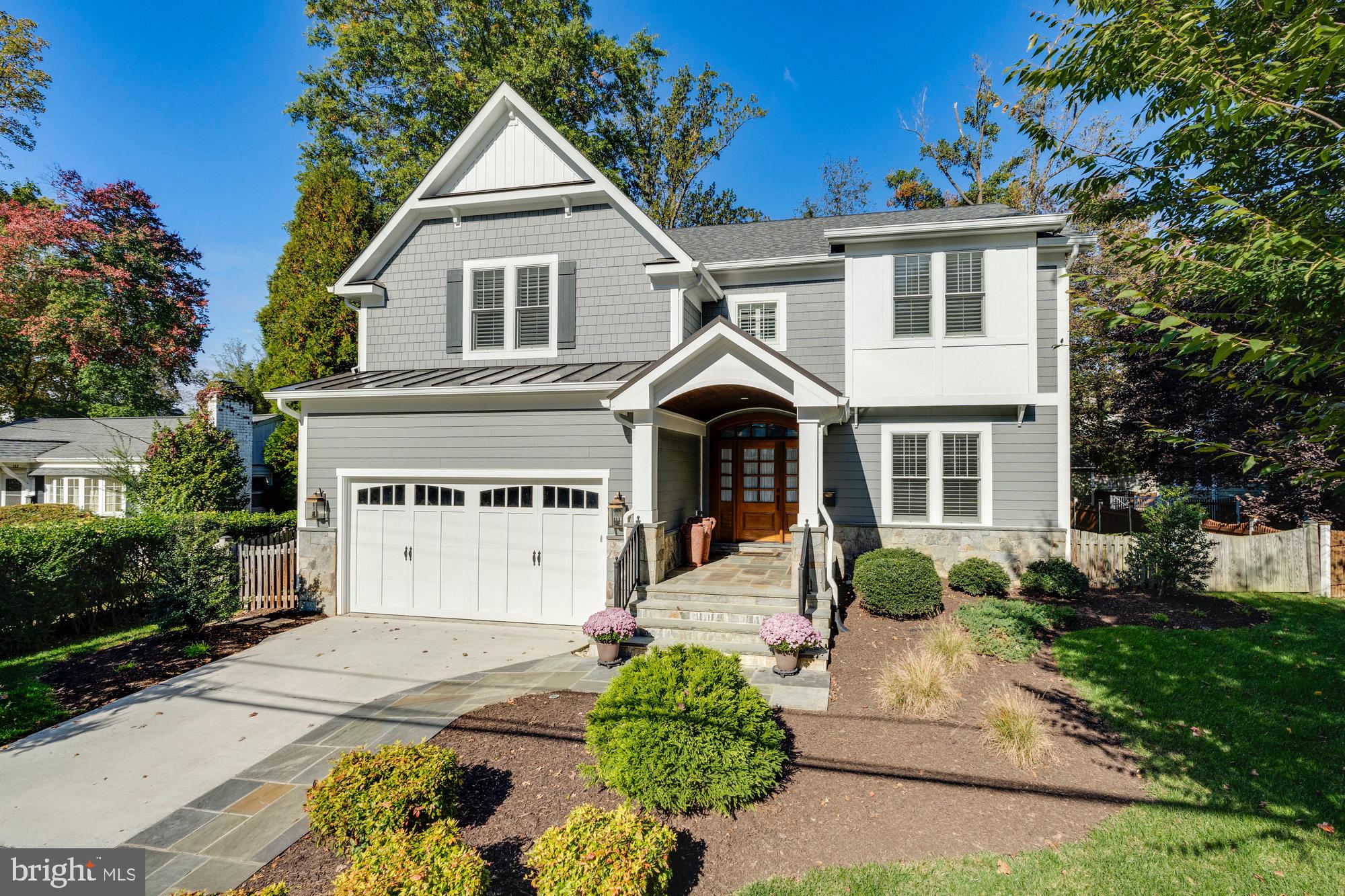 Stunning custom-built Fisher home located right in the heart of downtown Vienna. This home has 5 bedrooms, 4.5 bathrooms, 4,491 finished square feet and is sited on a .23 acre lot. High end and energy efficient home boasts oak hardwood flooring, custom built-ins, plantation shutters, and more! With an open floor plan designed for entertaining, this home features a formal living room, formal dining room, family room with a gas fireplace, and mudroom. The gourmet kitchen boasts a center island, quartz countertops, stainless steel appliances, and a breakfast room. The spacious owner’s suite includes a luxurious ensuite bathroom and two walk-in closets. Three additional bedrooms and two full bathrooms each with en suite access on the upper level. The finished walk-up basement has a recreation room, custom-built 200 wine bottle storage, wet bar, fifth bedroom, and a full bath. Outside, you'll enjoy a fully fenced quiet backyard that backs to trees, two car garage and spacious driveway for multiple cars. Convenient Vienna location close to parks, metro, shops and restaurants.