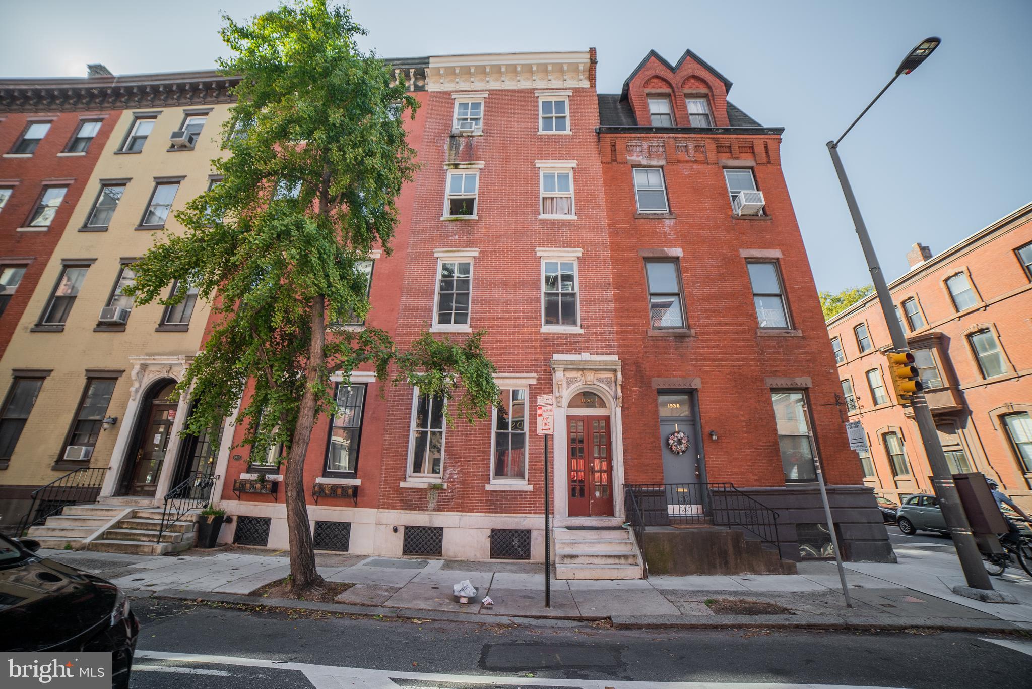 Grand building with original features in unbeatable location, a block from Rittenhouse Square. 7 residential units; 6 One Bedroom units and 1 Studio unit. Restored brick front with new windows. Wood floors, 3 ornamental fireplaces, and high ceilings throughout. Separate hot water heat for each unit. One hot water heater for all the units replaced 09/ 2019. Shared washer/dryer in the Basement. Owner pays electric. Large lot 18  x 103 , 4400 square feet. Property needs updating.