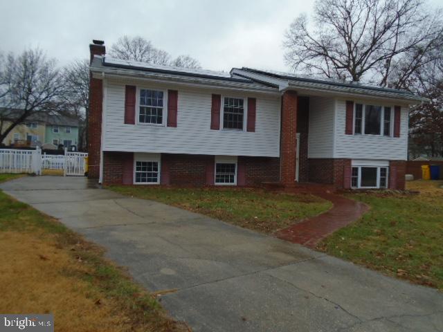 Nice size Split Foyer in Millersville situated on .19 lot in a cul-de-sac.  Upper level has hardwood floors in living & dining rooms. Deck off Dining room over looks fenced rear yard. Owners bedroom has private bath. Full bath and 2 other bedrooms complete upper level. Lower level is finished with  huge family room with wood fireplace surrounded by brick and built ins.  Also has 4th bedroom or den and powder room. Separate laundry and utility room . Walk out steps to rear yard.