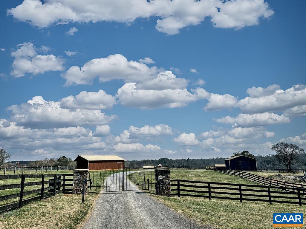 Beautiful 115� acre countryside property in Madison County offering open fields, established fencing and a peaceful rural setting ideal for horses, farming or a private country estate. The land features multiple paddocks, run-in sheds, and a charming brick manager?s residence, providing immediate usability while allowing flexibility for future improvements.  The gently rolling acreage offers excellent pastureland with scenic views of the surrounding countryside. The property is well suited for equestrian enthusiasts seeking a manageable farm, a small agricultural operation, or those looking to create a custom country retreat.  Conveniently located with access to Route 29 and nearby Charlottesville, the property offers the rare combination of privacy, open land, and accessibility to area amenities, wineries, and the Blue Ridge Mountains.  An exceptional opportunity to own a beautiful tract of land in one of Central Virginia?s most desirable rural settings.