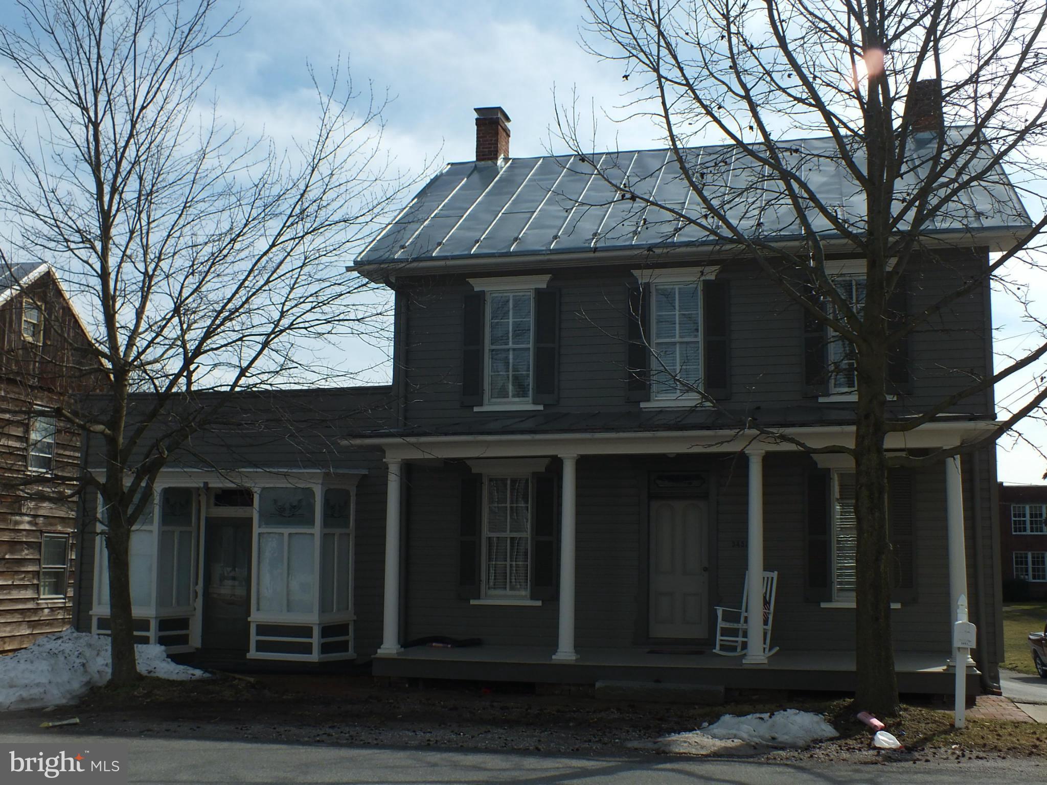 Beautifully updated historic home in Uniontown - totally new kitchen, baths and laundry as well as fresh paint and refinished hardwood floors throughout the home. Enjoy sitting and relaxing on either the front or the back covered porches.