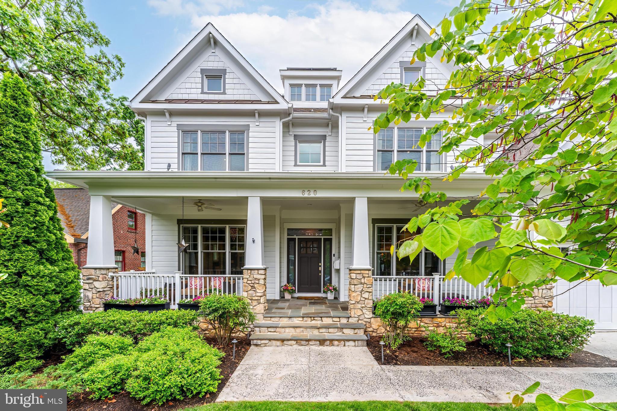 620 N Lincoln Street: A Masterpiece in Ashton Heights!  Nestled just three blocks from the Virginia Square Metro, this extraordinary 7,000-square-foot custom home represents the pinnacle of luxury living in one of Arlington's most coveted neighborhoods. Crafted by Stanley Martin Custom Homes and BOWA Construction, the property sits on a spacious 8,500-square-foot lot, offering an unparalleled blend of sophisticated design and functional elegance. 2.75% Assumable Mortgage.​ The home welcomes you with a light-filled foyer featuring multiple transom windows, setting the tone for the exceptional craftsmanship that continues throughout the property. The main level boasts a chef's kitchen equipped with top-of-the-line Sub-Zero, Wolf, and GE Monogram appliances, complemented by a custom BOWA pantry that meets the needs of even the most discerning home chef. Adjacent, a stunning family room showcases a coffered ceiling, custom built-ins, an integrated sound system, and a fireplace—perfect for both intimate gatherings and grand entertaining.​  An impressive screened Equinox porch provides year-round outdoor enjoyment, seamlessly extending the living space with its motorized roof system. The formal dining room, with its elegant coffered ceiling and custom wainscoting, offers a sophisticated backdrop. A versatile main-level office/bedroom with a private en-suite bathroom provides additional flexibility, while the expansive laundry room features built-in cabinetry and a convenient folding island.​  The upper level reveals a luxurious primary suite that redefines residential comfort. A spacious bedroom connects to a sitting room with custom built-ins and a two-sided fireplace, opening into a walk-in luxury closet with a custom island and display cabinets. The spa-like primary bathroom features dual vanities, a separate shower, and a soaking tub—a true retreat within the home. Additional bedrooms, each with private bathrooms, provide ample space and privacy for family and guests.​  The loft level features multiple zones designed for recreation, entertainment, and productivity. A dedicated additional office provides the perfect sanctuary for remote work or study.  An extra bedroom and accompanying bathroom make this level ideal for guests or multigenerational living, offering privacy and comfort beyond the main living areas.​  The lower level finished basement offers a large recreation room, and serves as an entertainment hub, featuring a dedicated fitness room with supplemental cooling and a flexible space currently used as a craft room but easily convertible to a wine room or additional living area. The home's eco-friendly features are equally impressive, including a 70-panel solar photovoltaic system, a Generac Guardian standby generator, and a sophisticated water filtration system with reverse osmosis and UV sanitization.​  Outdoor spaces are equally thoughtful, with a fully fenced yard featuring an irrigation system and landscape lighting. A wide front porch with flagstone flooring adds to the home's curb appeal, while the oversized two-car garage provides ample storage and parking.​  With a rare assumable mortgage at 2.75%, this home offers not just a living space, but a lifestyle. Located within easy walking distance of Virginia Square, Ballston, and Clarendon's vibrant dining and shopping.