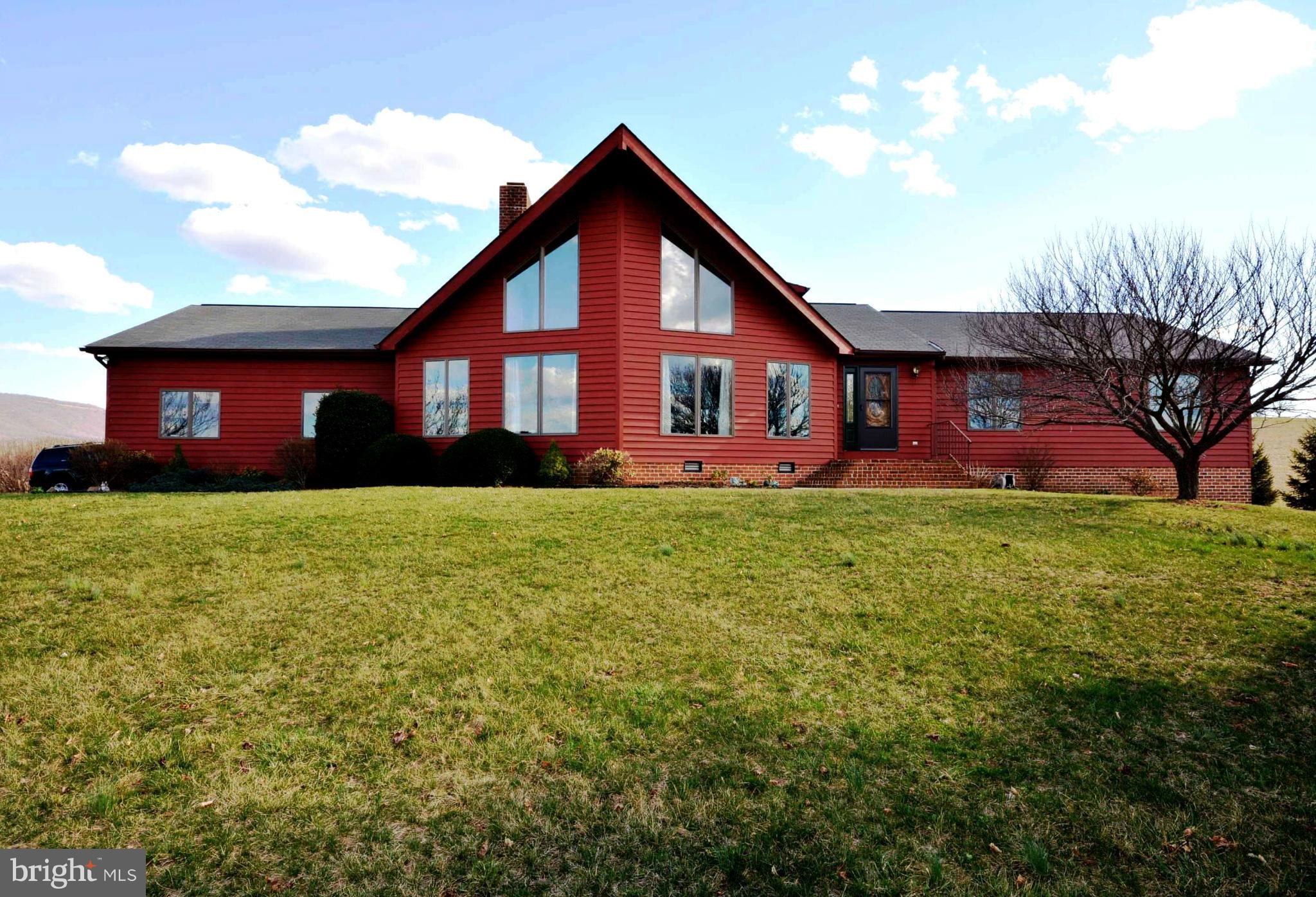 "GORGEOUS MOUNTAIN VIEWS ALL YEAR ROUND" This Well Maintained Chalet on 5 Acres offers Hardwood Floors, Cathedral Ceiling, Quartz Kitchen Counter-tops, Hammered Copper Kitchen Sink, Upgraded Appliances, Tile Flooring, Interior Wood Doors & Trim, Screened Porch already Wired for Hot Tub, Mature Landscaping and Asphalt Driveway Lined with Bradford Pear Trees. Main Level Entrance. **River Access**