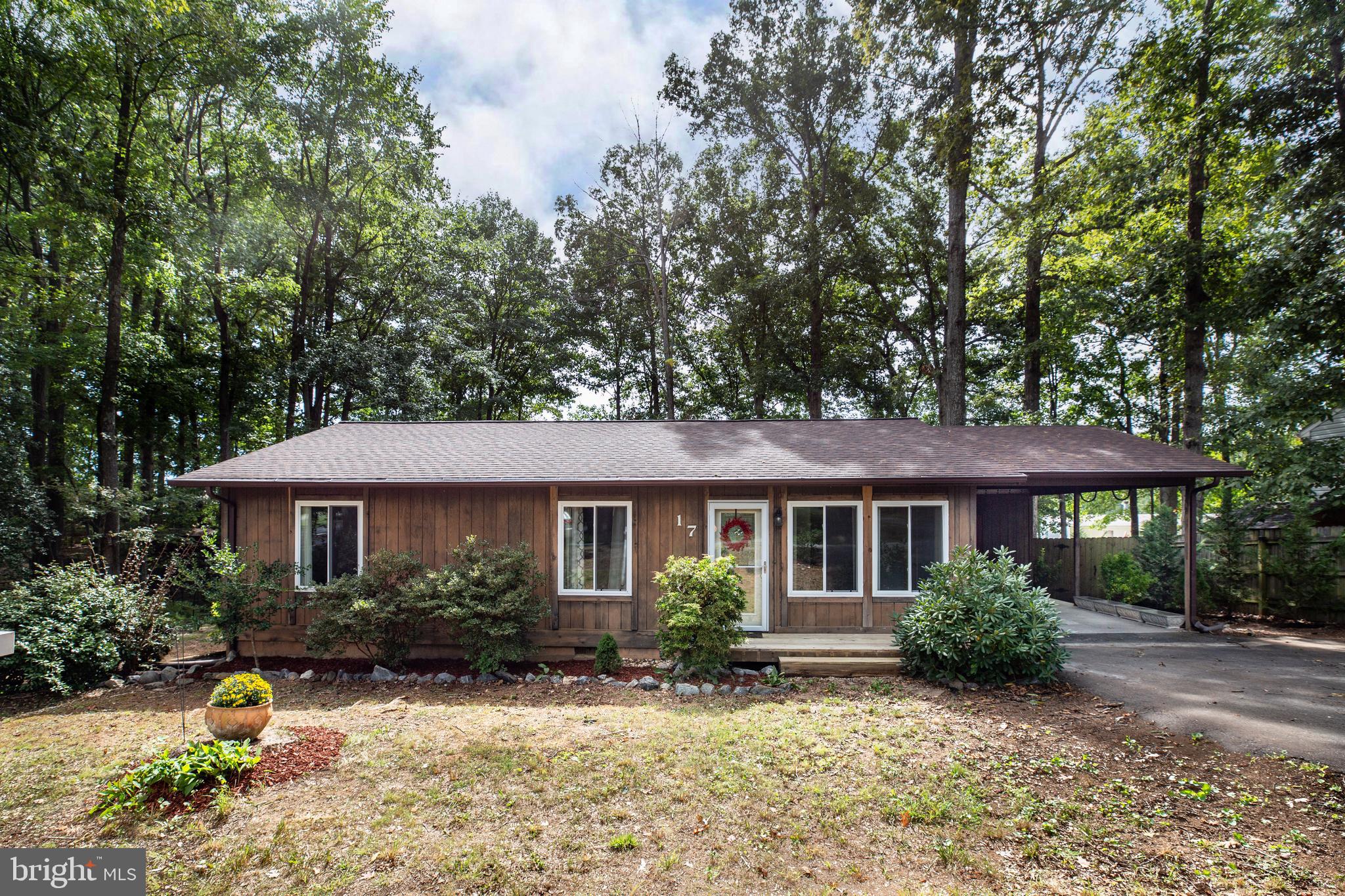 ***Brand new HVAC system will be paid for by Seller at closing and installed after closing, High Efficiency 2­Ton Heat Pump System***Great 3 bedroom and 1.5 bathroom Rancher/Rambler with 1,135 sqft on 0.33 acres in The Timbers Neighborhood. No HOA! Spacious deck overlooking a private and large backyard, wonderful for entertaining. Fresh paint throughout and all appliances were newly updated 3 years ago. Attached carport with additional storage. Engineered wood flooring throughout the dining room, living room, kitchen, and hallway. Oversized windows allow for great natural lighting. Spacious living room with a nice view of the deck and backyard. Conveniently located 8 minutes from Central Park and I-95. 18 minutes to Downtown Fredericksburg.