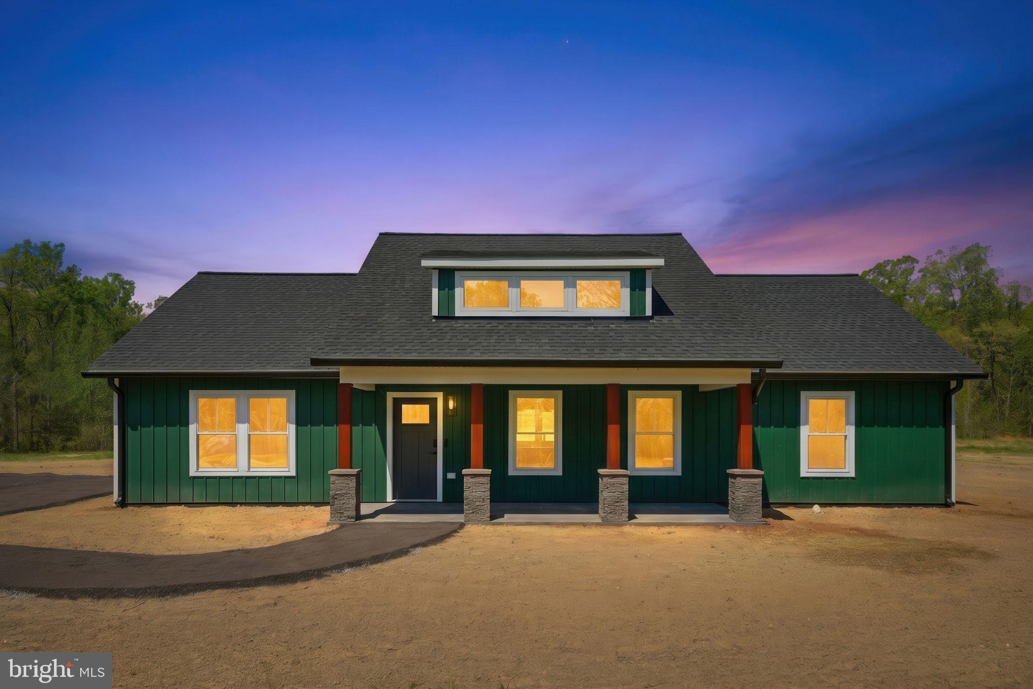 Fantastic Tech Laden New Construction! A wonderful interpretation of the modern farmhouse/craftsman home.  Situated on 5.5+ private acres, this new build checks literally ever single box!  Boasting 3 Bedrooms and 2 Baths,  this home offers over 1,600 sq/ft of refined and thoughtfully designed sun drenched space.  Note the premium metal board and batten siding, colored concrete porch and patio, vaulted ceilings with faux wood beams, huge windows, upgraded gourmet kitchen with quartz island and waterfall (with downlighting), smart Samsung appliance package, soft close cabinetry, beautifully finished baths, LVP throughout the entire home, functional mud room  with built-ins, Fireplace and Flat Screen TV wall and so much more!  Tech focused design ... Home offers built-in smart home control hub, smart appliances, smart thermostat, Alexa-enabled Echo Spot bathroom speakers with touchscreen displays, smart self-emptying robot vaccum, full Eufy security system with dual video doorbells, floodlight camera with tracking and smart lock with fingerprint recognition.  Simply Not to Be Missed!