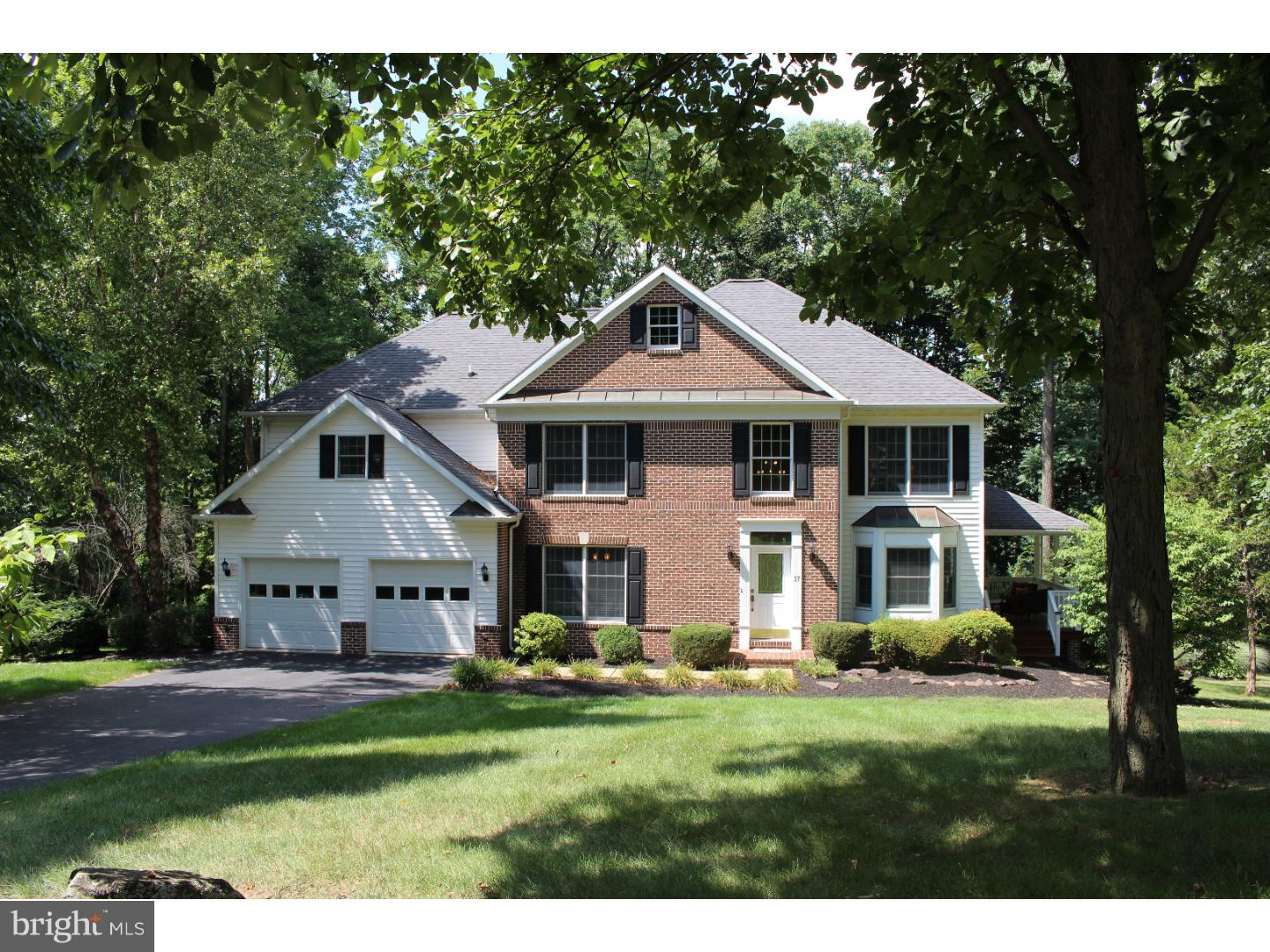 Stunning 5 Bedroom Brick Home in the desirable Kinsey Hill Development.  This spacious home offers 4515 sq. ft. and is located on a tree lined cul-de-sac street.  It offers a neighborhood setting plus privacy, since it borders on woods.  Entering the home you notice the dramatic 2-story entry with the balcony.  Split staircase leading upstairs from the front entry or kitchen.  French doors lead to the formal dining room on one side and additional french doors open to the formal living room, which is being used as an office. The magnificent custom oak kitchen will be a dream to cook in with the Corian counter tops, breakfast bar, double oven and Sub=Zero refrigerator.  Great room features a beautiful gas fireplace  with outside access via the covered side porch.  Striking scenic wooded views are visible from many locations in the house!!  The second floor boasts 4 bedrooms.  Neutral interior was just painted and completely newly carpeted throughout! Cozy up to the lovely warm fireplace in the spacious Master Bedroom as well as an additional sitting area.  The bathroom is spectacular!  Whirlpool tub...Glass shower...his and her vanities!  There are the 3 other roomy bedrooms upstairs and an additional full bath.  The finished walk-out daylight basement features the 5th bedroom and full bath, that could be used as In-Law quarters.  There's a large recreation room and wet bar.  Seller will transfer the AHS Warranty that is currently on the house.  Also includes a lovely large deck and back yard for family fun and entertaining. Convenient location to shopping, schools and recreation!  Easy access to Rt.422, 176 minutes from the PA Turnpike with points traveling to Chester, Montgomery and Lancaster Counties.  This home has many wonderful, quality upgrades!! Please schedule a showing and come see for yourself!!