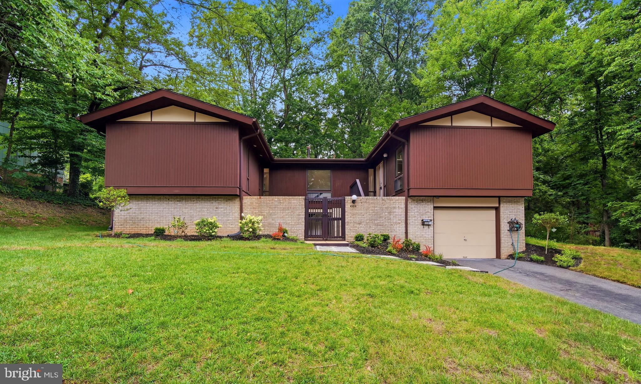 There is something special about a home that feels tucked away from it all while keeping everything within easy reach. Set on nearly half an acre and backing to mature trees in Annandale's beloved Truro neighborhood, this beautifully reimagined home offers the kind of privacy and tranquility that is increasingly hard to find.

Mornings begin with coffee overlooking a canopy of trees. Afternoons are spent enjoying a backyard that feels more like a private park than a suburban lot. Whether hosting friends on the newly built patio, gardening in the expansive yard, or simply enjoying the quiet surroundings, this is a home that invites you to slow down and stay awhile.

Inside, every space has been thoughtfully updated to support the way people live today. The completely redesigned kitchen serves as the heart of the home, featuring custom cabinetry that extends to the ceiling, quartz countertops, and an open layout that creates a natural flow between living, dining, and outdoor spaces. Beautiful new flooring carries throughout the main living areas, while the renovated bathrooms bring a sense of comfort and calm with timeless, spa-inspired finishes. A newer roof, replaced in 2019, adds peace of mind for years to come.

What truly sets this property apart is the land. The combination of a flat, usable lot and a backdrop of mature trees creates a setting that is both functional and private. There is room to entertain, play, garden, and gather, all while enjoying the feeling of being surrounded by nature.

Life in Truro extends beyond the property lines. Neighbors enjoy an active community with a pool, tennis and pickleball courts, basketball court, clubhouse, playgrounds, walking trails, and year-round events. The home is also zoned for highly regarded Wakefield Forest Elementary, Frost Middle School, and Woodson High School.

Just minutes from the Mosaic District, Tysons, Fairfax City, and major commuter routes, this home offers a rare combination of thoughtful updates, exceptional outdoor space, and a location that keeps you connected while feeling a world away.