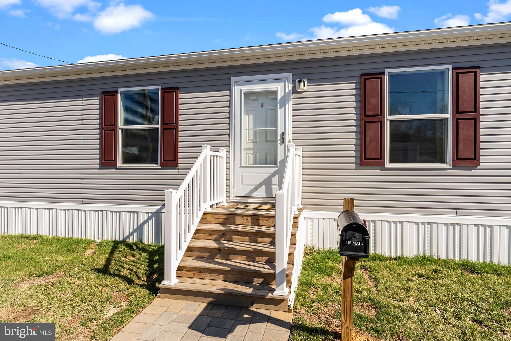 Welcome to 3429 Azalea Ave, a beautifully maintained mobile home built in 2022 that feels practically brand new. With 2 spacious bedrooms and 2 full bathrooms—including a private en-suite in the master bedroom—this home offers modern comfort in a clean, open layout. Step through the front door into a bright, open-concept living room that flows seamlessly into a stunning kitchen, perfect for both everyday living and entertaining. The home features newer storm doors and a newer washer and dryer, adding peace of mind and convenience. Down the hall, you’ll find a private laundry room with direct access to the backyard—ideal for easy, functional living. Each room in the home is generously sized, and the overall space feels fresh, airy, and barely lived in. Don't miss out on this opportunity for low-maintenance, easy living in a like-new home.  Monthly fee of $840 includes water, sewer and trash. Schedule your tour today!