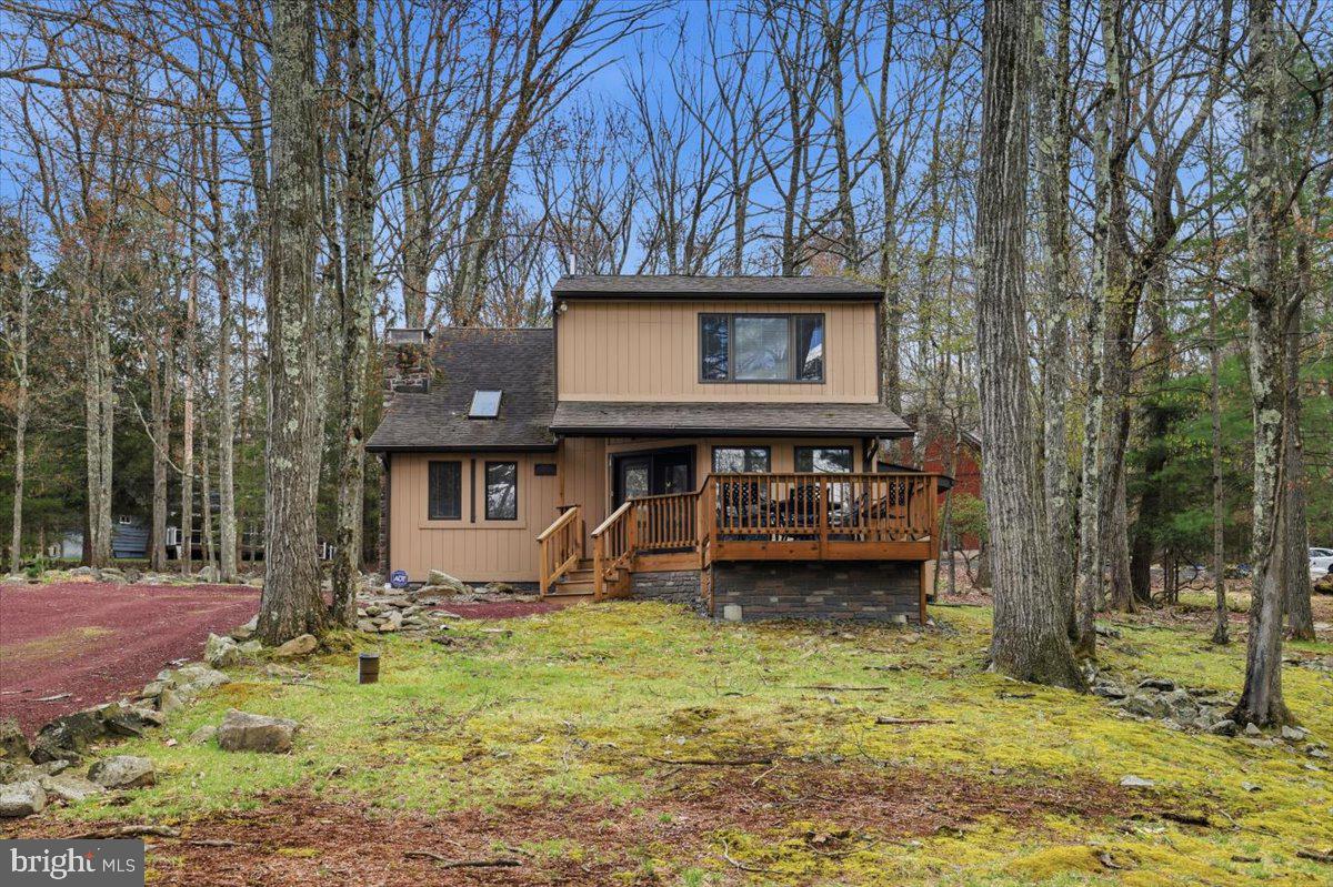 Welcome to your perfect Pocono retreat in the highly sought-after Lake Harmony community! This charming 3-bedroom, 2-bathroom home offers 1,605 square feet of comfortable living space, ideal for both personal enjoyment and investment potential. This TURNKEY house is ready, whether you're searching for a relaxing vacation getaway or a short-term rental opportunity, this property checks all the boxes.

Step inside to a warm and inviting open-concept layout, perfect for gathering with family and friends. The spacious living area flows seamlessly into the kitchen and dining space, creating an easy, functional environment for entertaining or cozy nights in. Large windows bring in natural light and highlight the surrounding beauty of the Pocono Mountains.

The main level features a convenient first-floor bedroom, ideal for guests or flexible living arrangements. Upstairs, you’ll find two additional bedrooms along with a full bathroom. Just at the top of the stairs, a spacious loft area provides the perfect spot for a second living space, game room, or relaxing lounge area.

Outside, enjoy the peaceful setting that makes Lake Harmony such a desirable destination. Located just minutes from popular attractions including skiing, lakes, golf courses, and year-round outdoor activities, this home offers both tranquility and accessibility.

With its prime location in an STR-friendly community, this property presents an excellent opportunity as a vacation home, income-producing rental, or full-time residence. Don’t miss your chance to own a piece of Lake Harmony—schedule your private showing today!